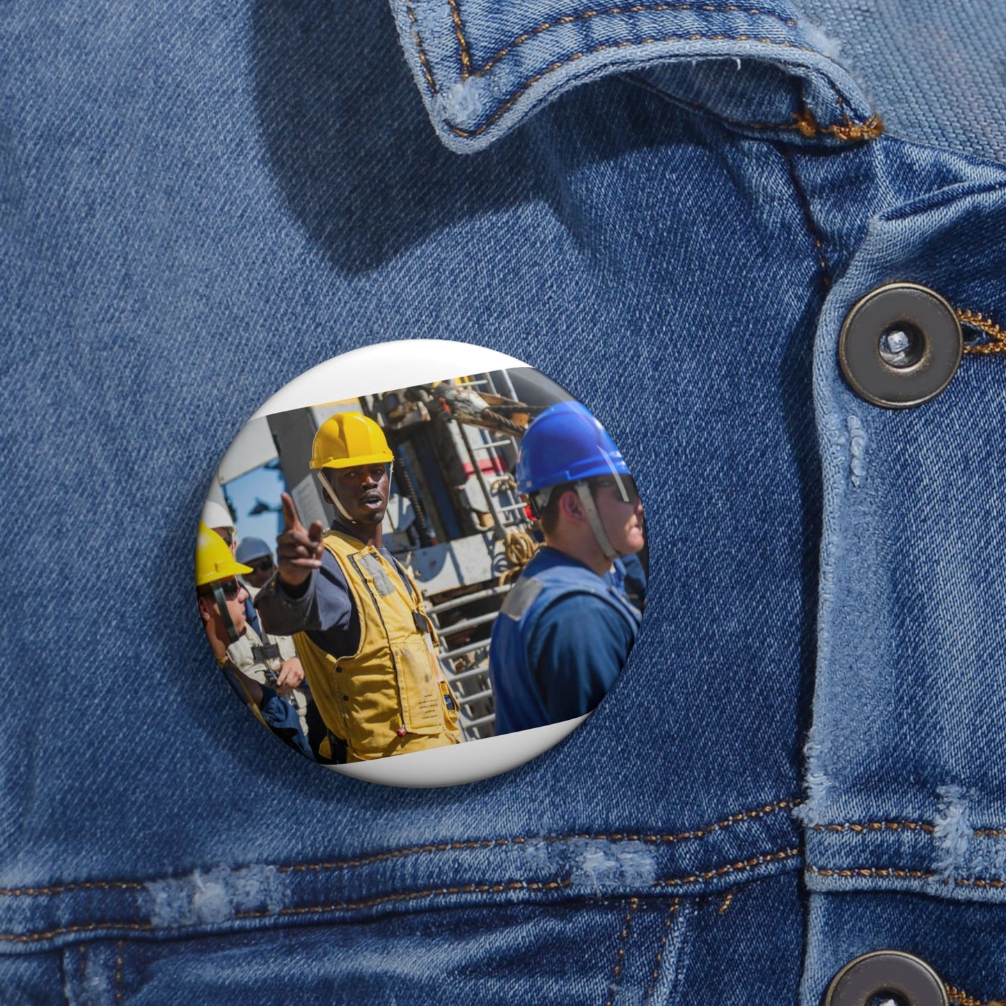 Seaman Glenrick Henry directs crew members as rig captain Pin Buttons with Crisp Design
