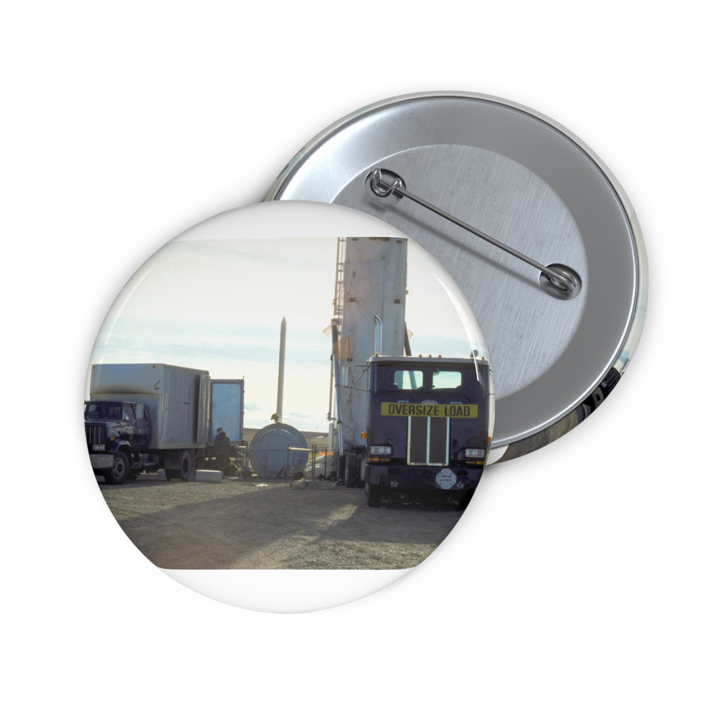 Members of the 44th Missile Maintenance Squadron erect a missile maintenance vehicle in preparation for the removal of an LGM-30F Minuteman II intercontinental ballistic missile. Pin Buttons with Crisp Design