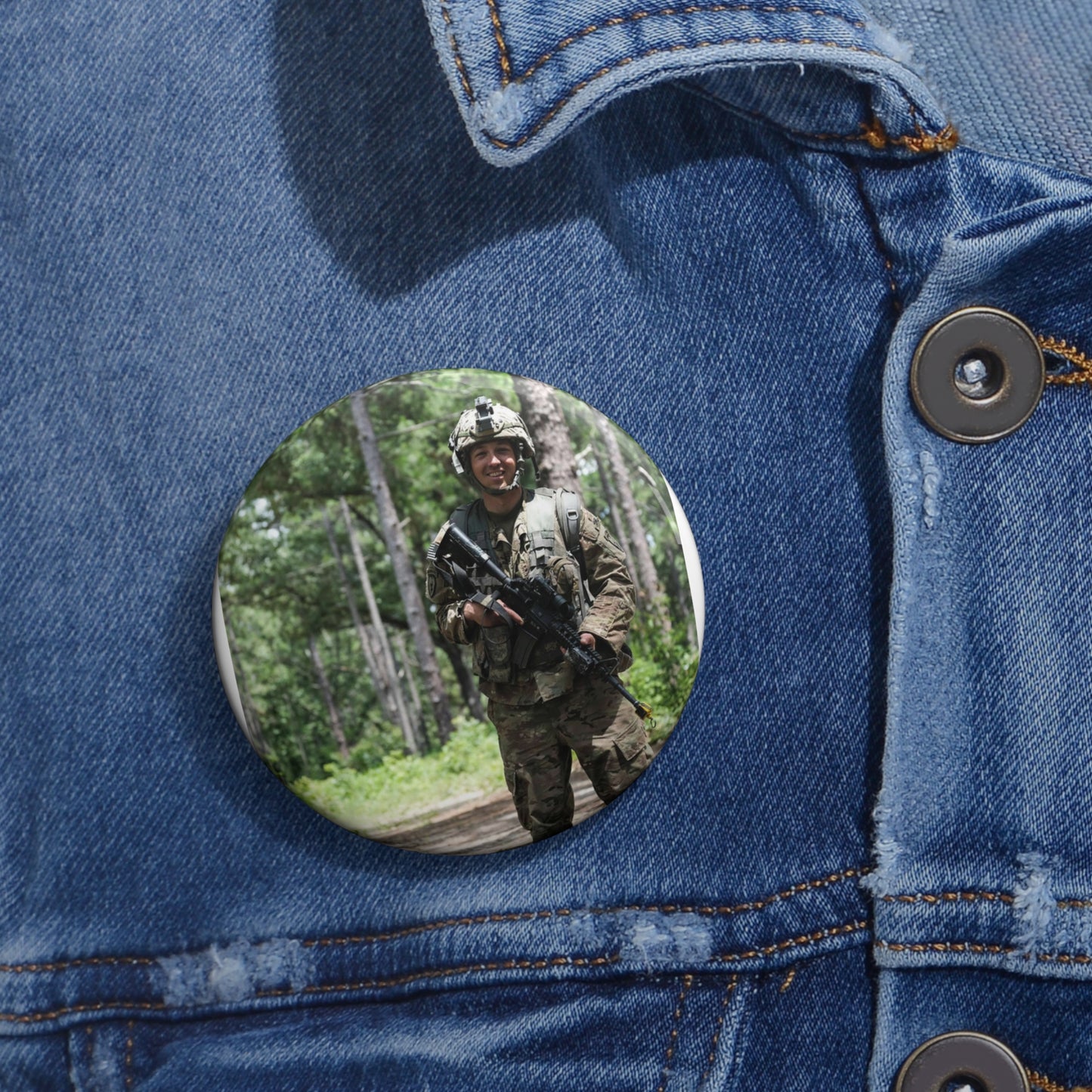 1st Lt. Jamieson Barnes an officer with Headquarters, Pin Buttons with Crisp Design