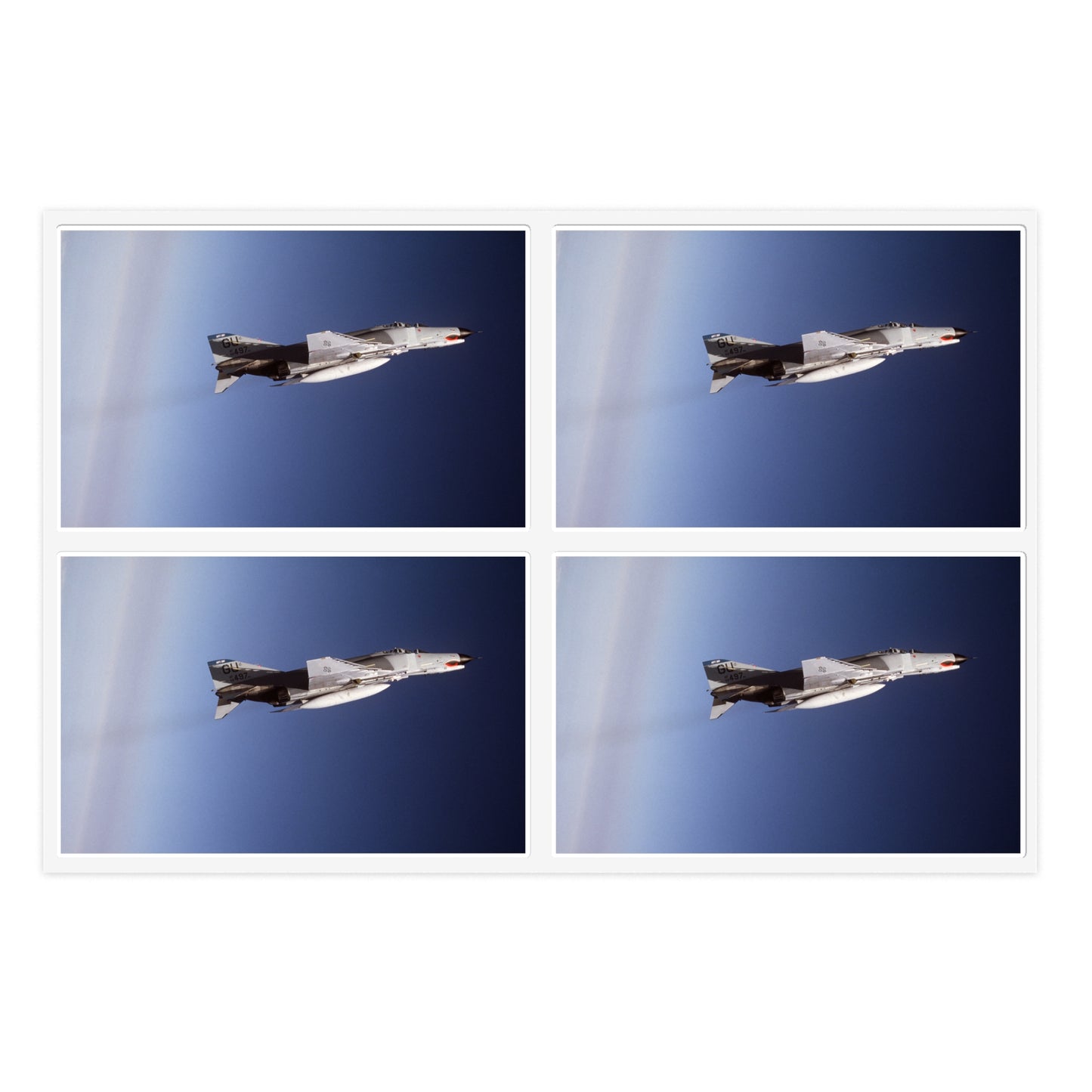 An air-to-air right side view of a 497th Tactical Fighter Squadron F-4E Phantom II aircraft in a vertical climb during Exercise TEAM SPIRIT'86. The aircraft is armed with an AIM-9 Sidewinder missile Laminated UV Protective Vinyl Stickers