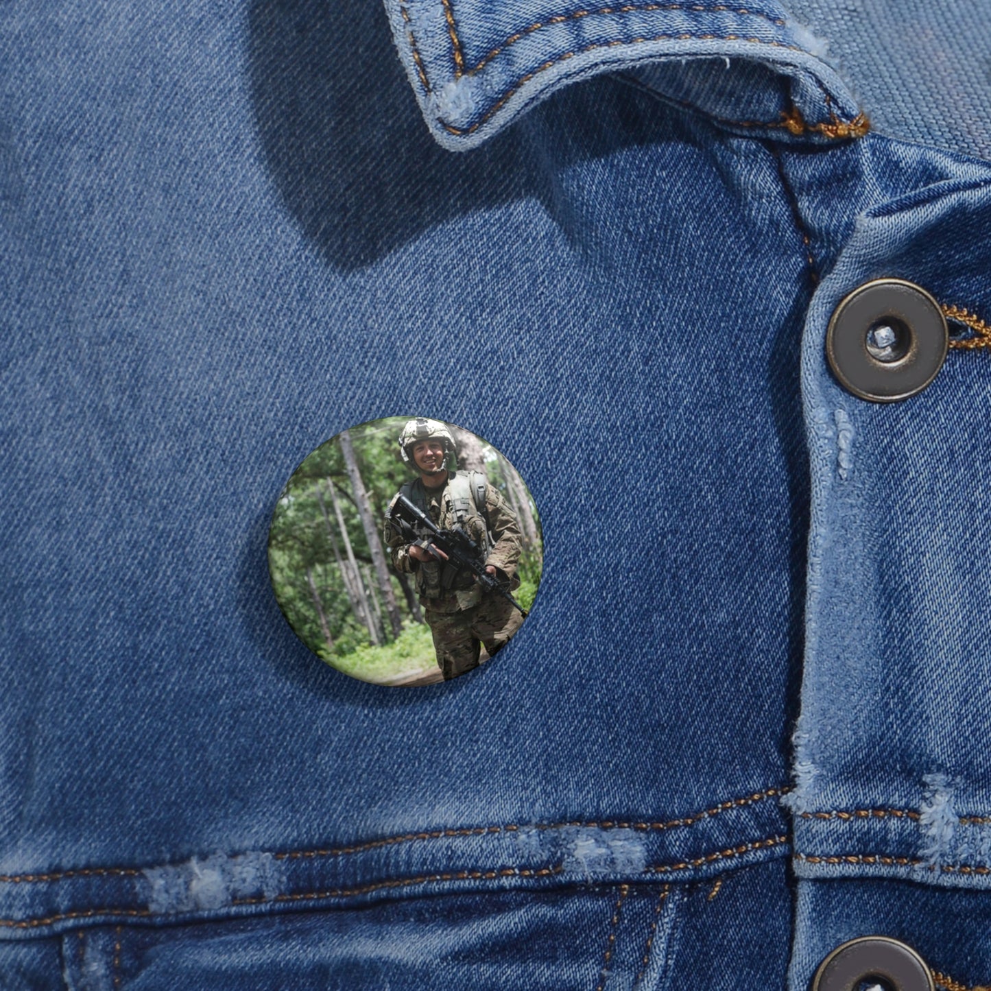 1st Lt. Jamieson Barnes an officer with Headquarters, Pin Buttons with Crisp Design