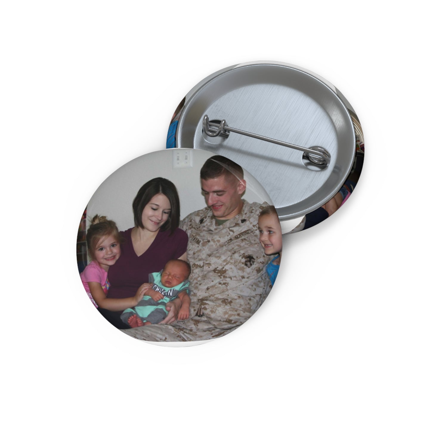 Sgt. Matthew Tatar and his wife Tiffany in their home Pin Buttons with Crisp Design