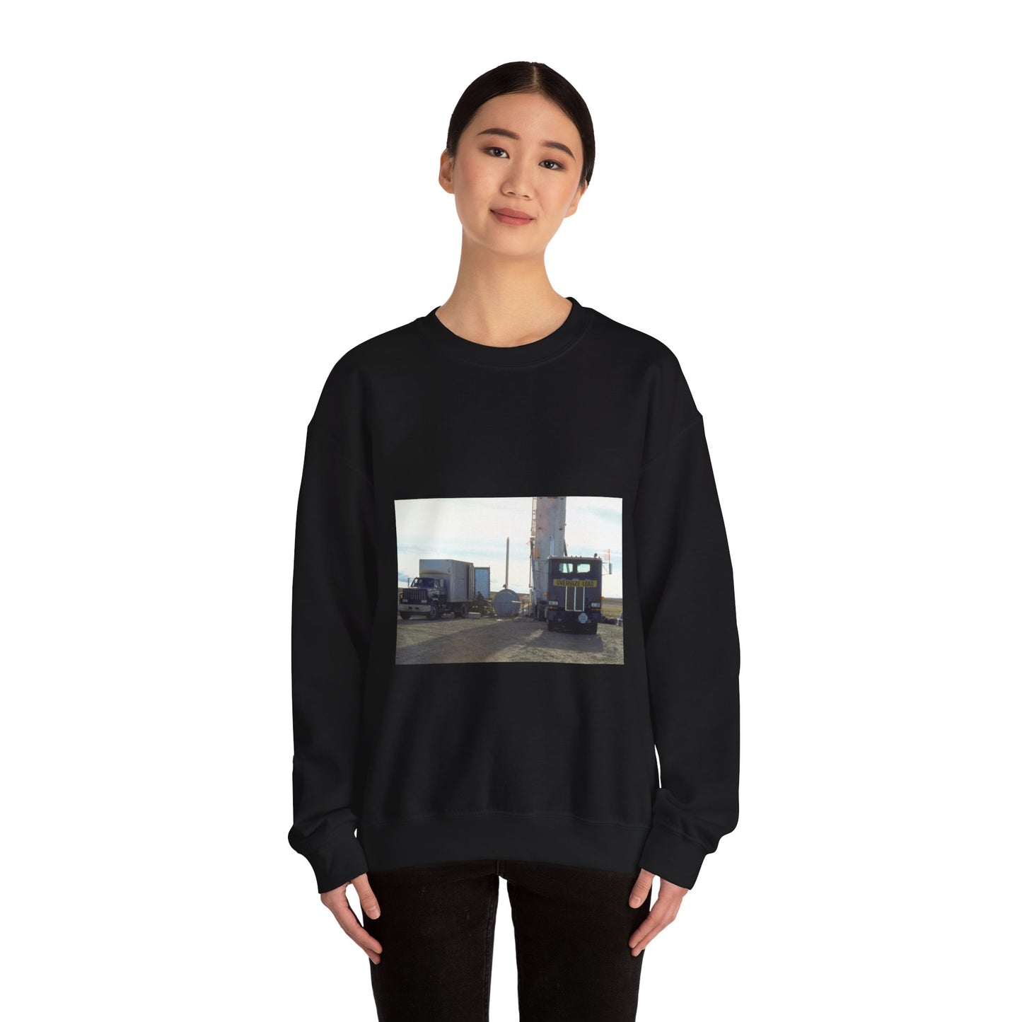 Members of the 44th Missile Maintenance Squadron erect a missile maintenance vehicle in preparation for the removal of an LGM-30F Minuteman II intercontinental ballistic missile. Black Heavy Blend Adult Crew Neck SweatShirt