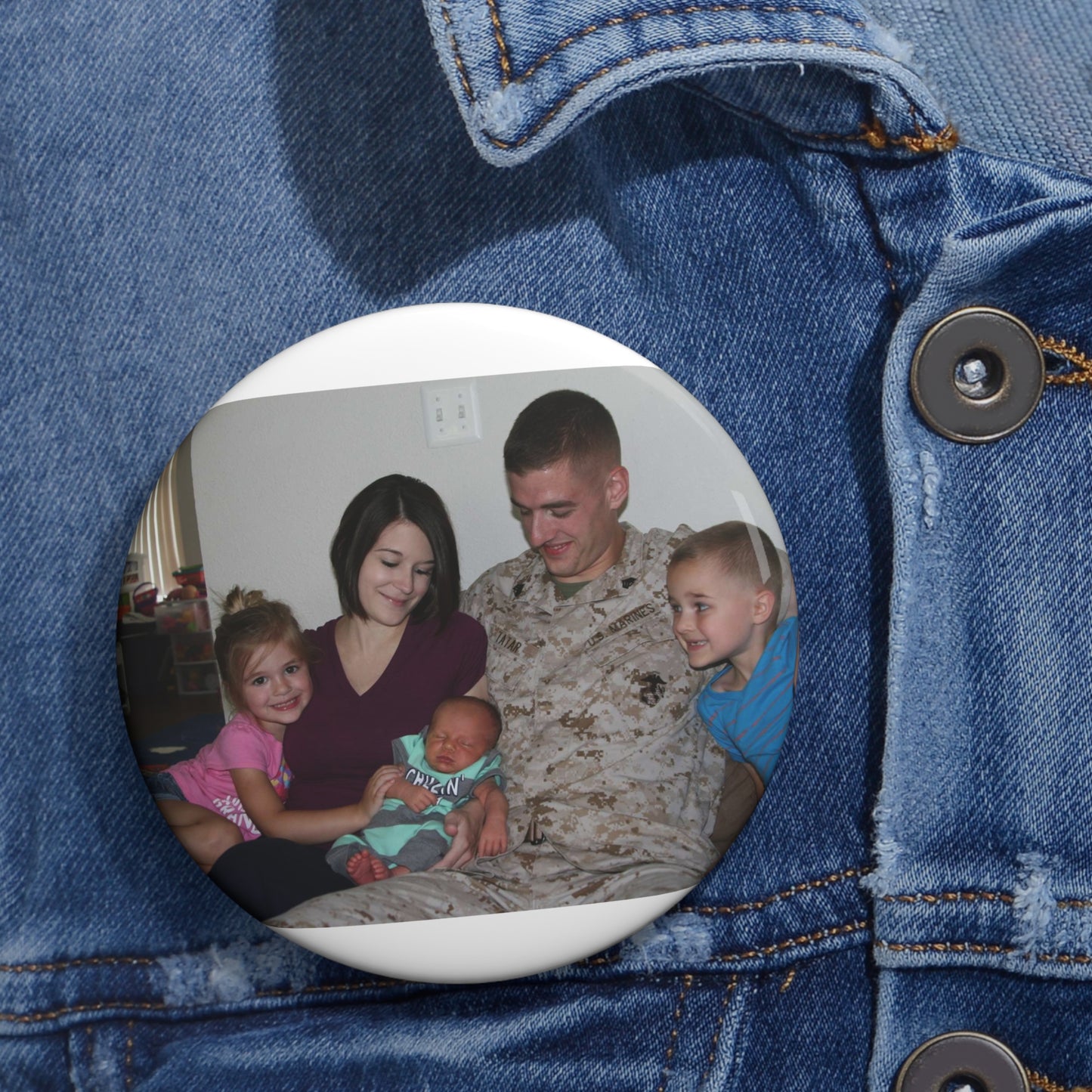 Sgt. Matthew Tatar and his wife Tiffany in their home Pin Buttons with Crisp Design