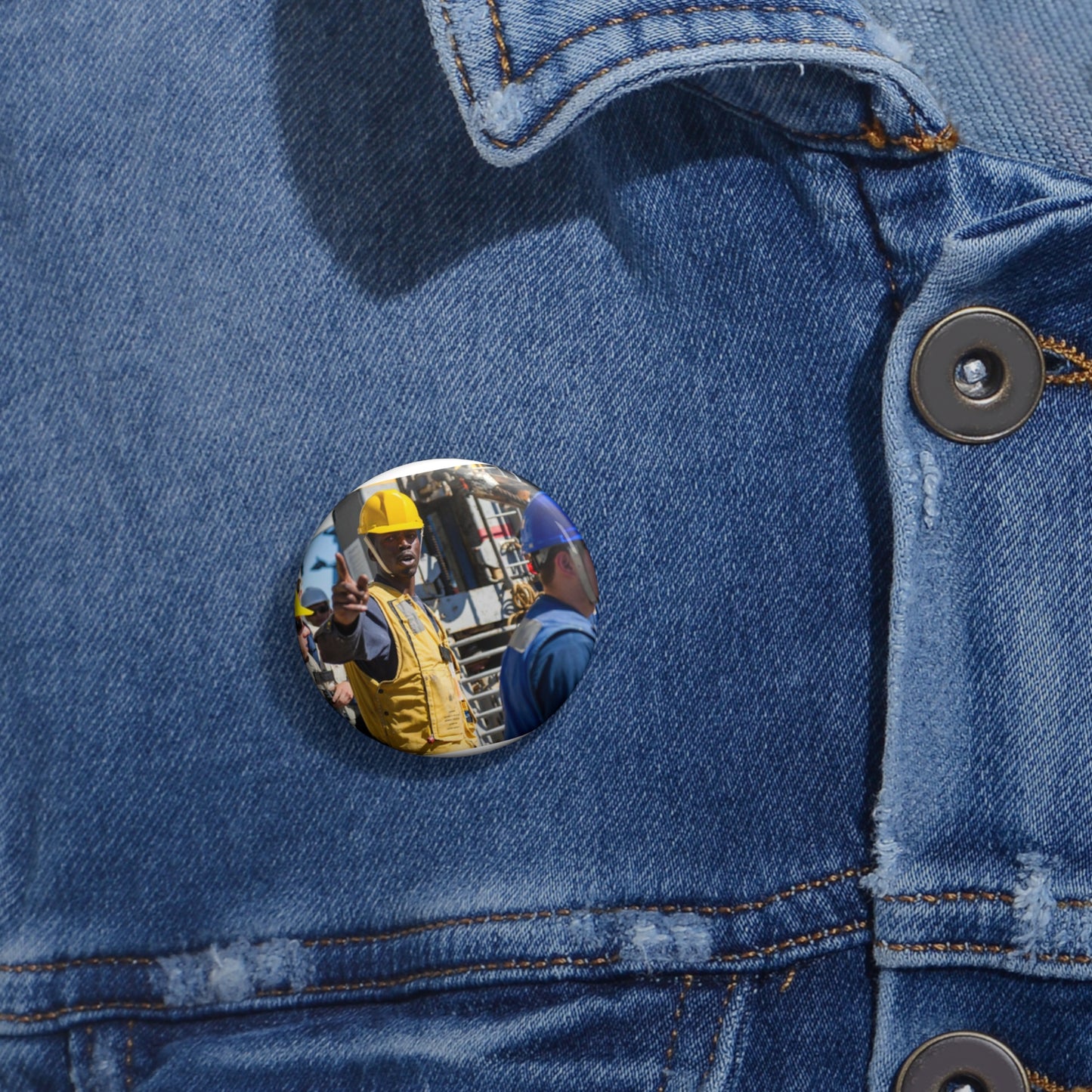 Seaman Glenrick Henry directs crew members as rig captain Pin Buttons with Crisp Design