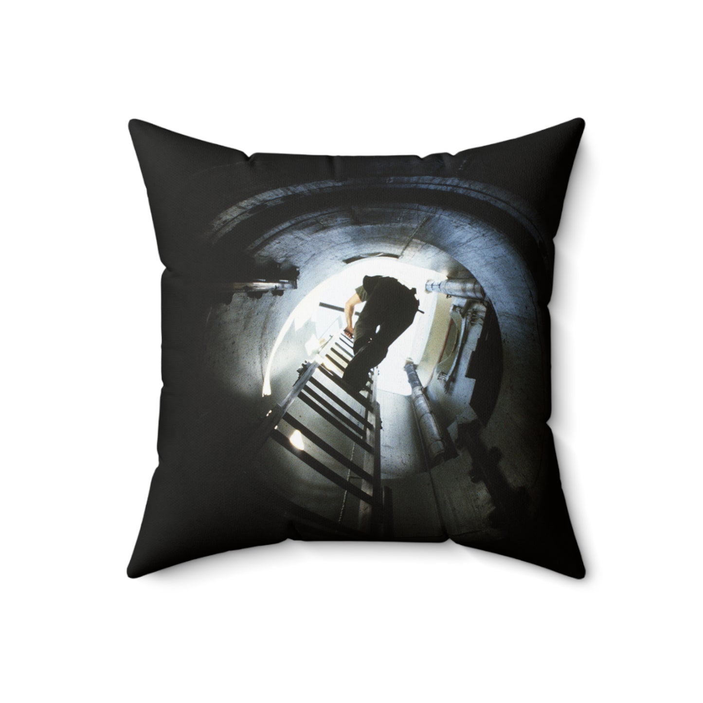 A 44th Field Missile Maintenance Squadron maintenance technician climbs down a ladder into a Minuteman missile support facility Decorative Accent Square Pillow