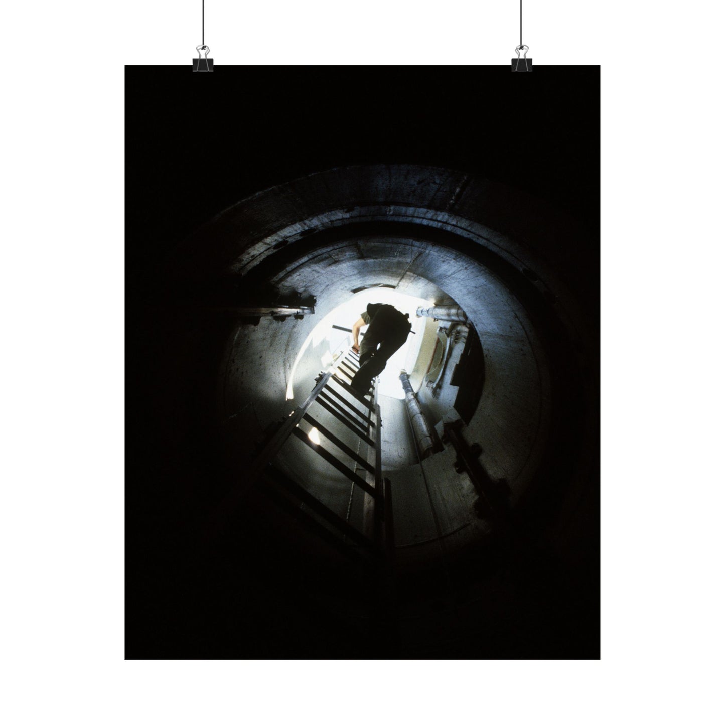 A 44th Field Missile Maintenance Squadron maintenance technician climbs down a ladder into a Minuteman missile support facility High Quality Matte Wall Art Poster for Home, Office, Classroom