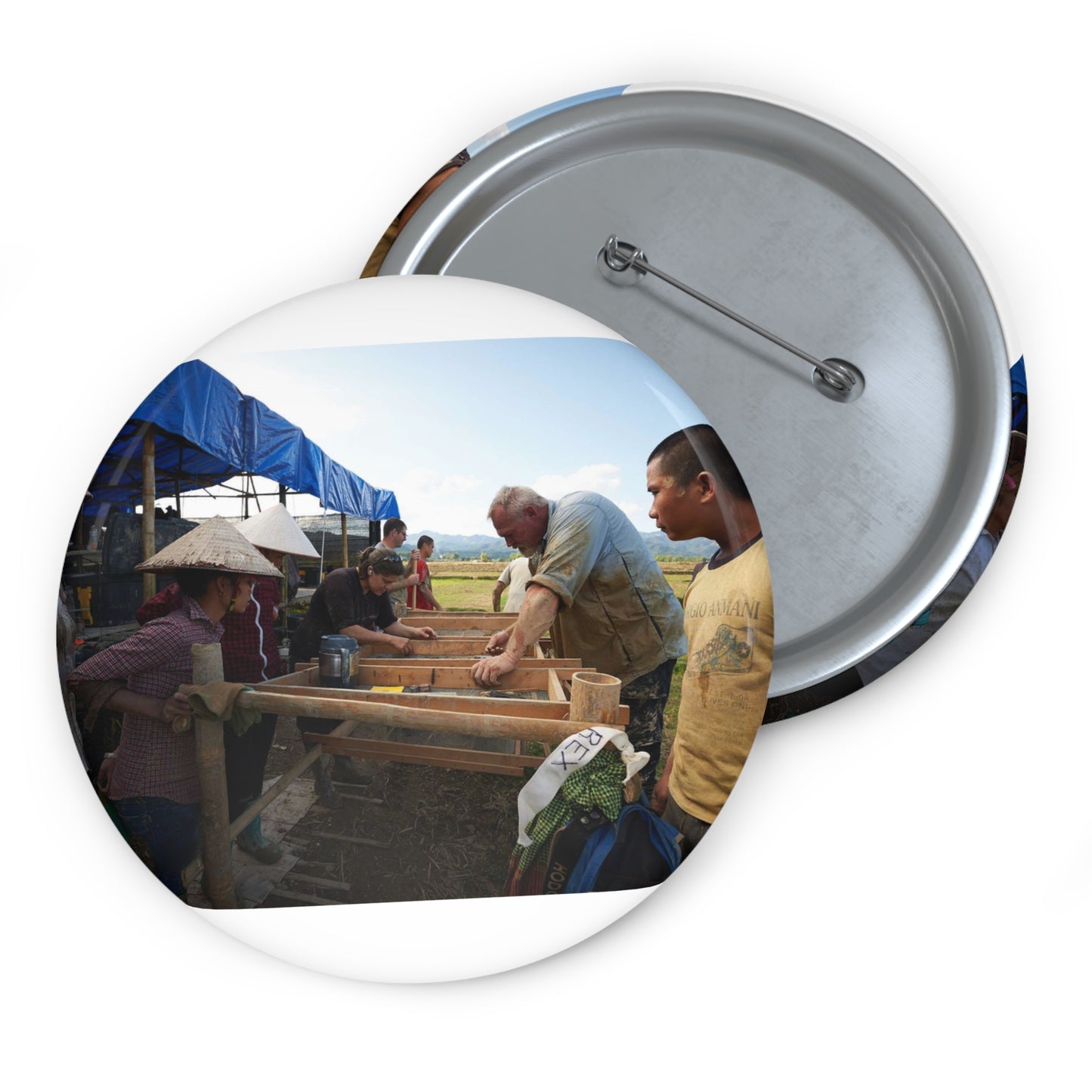Local workers gather around Dr. Kimberly Maeyama, Defense Pin Buttons with Crisp Design