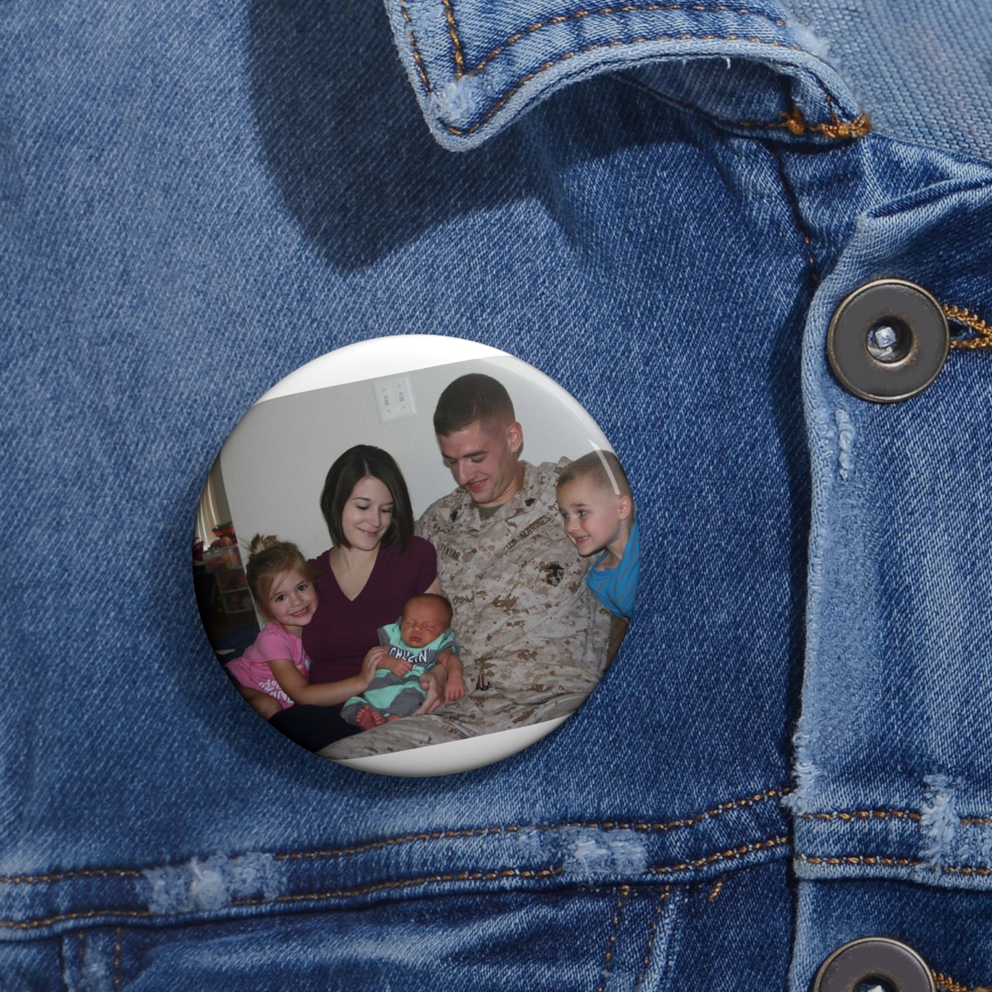 Sgt. Matthew Tatar and his wife Tiffany in their home Pin Buttons with Crisp Design