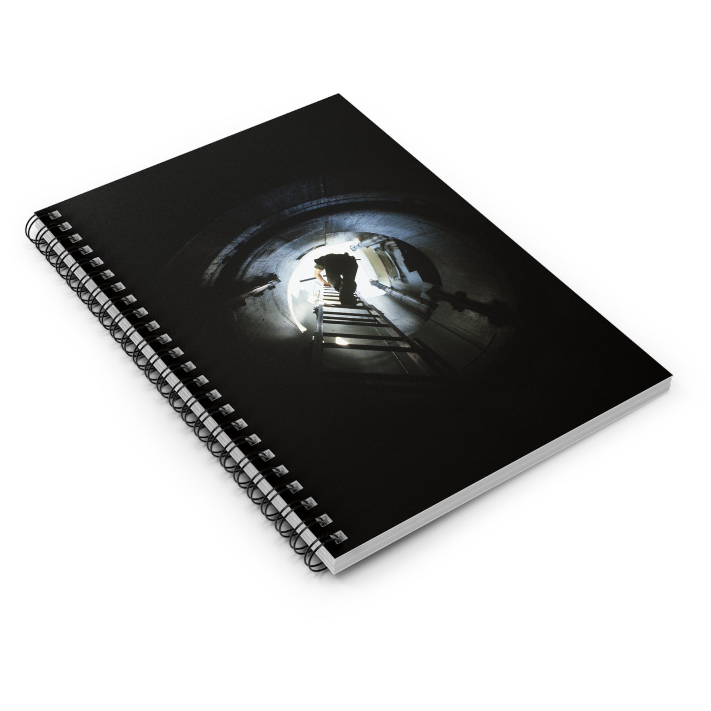 A 44th Field Missile Maintenance Squadron maintenance technician climbs down a ladder into a Minuteman missile support facility Spiral Bound Ruled Notebook with Printed Cover