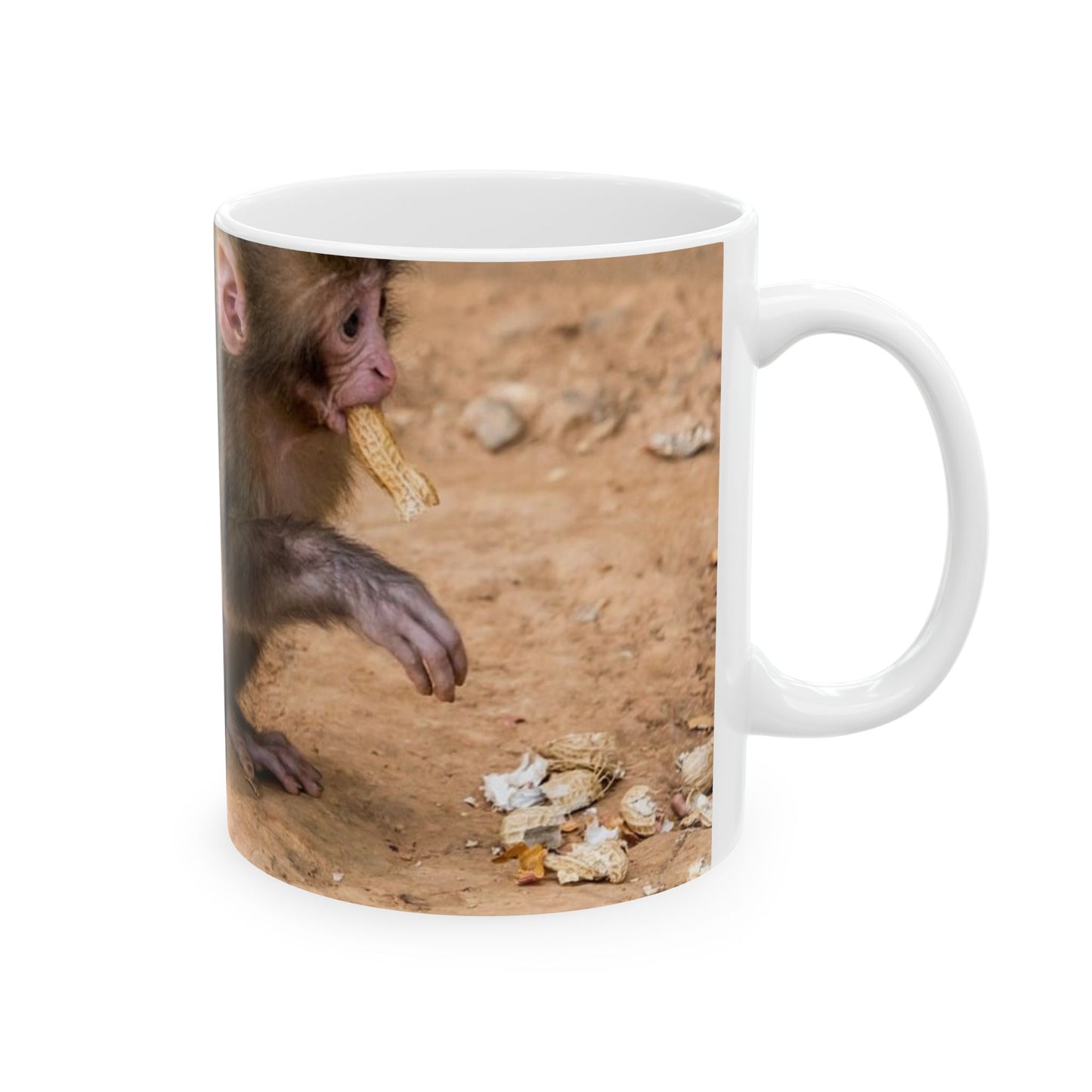 Public domain stock image. Monkey baby eating peanut. Beautiful Novelty Ceramic Coffee Mug 11oz