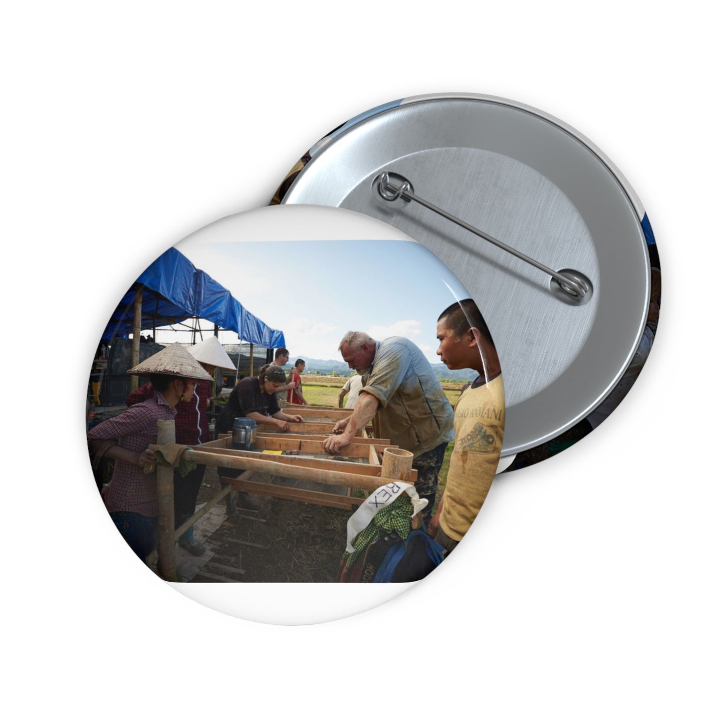 Local workers gather around Dr. Kimberly Maeyama, Defense Pin Buttons with Crisp Design