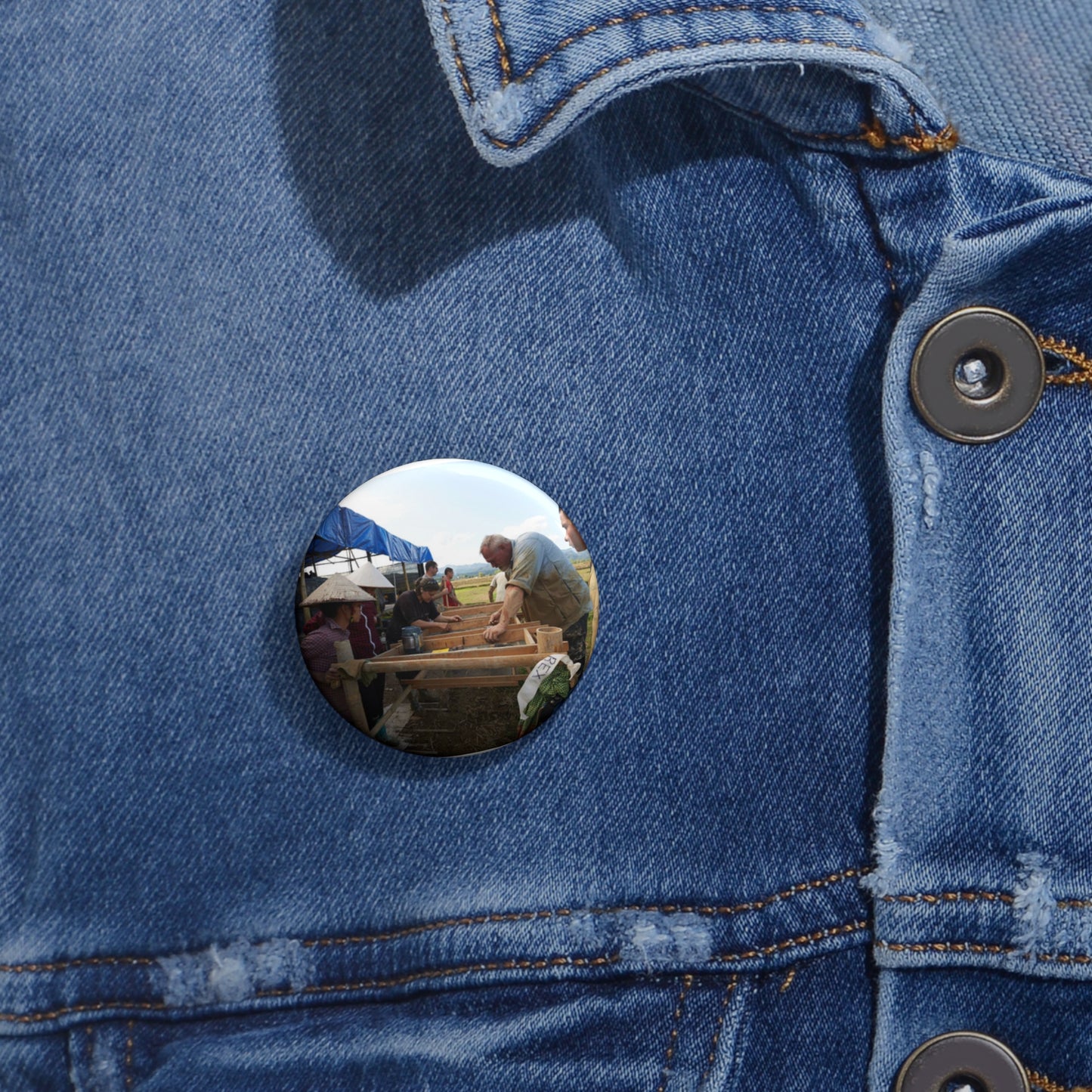 Local workers gather around Dr. Kimberly Maeyama, Defense Pin Buttons with Crisp Design