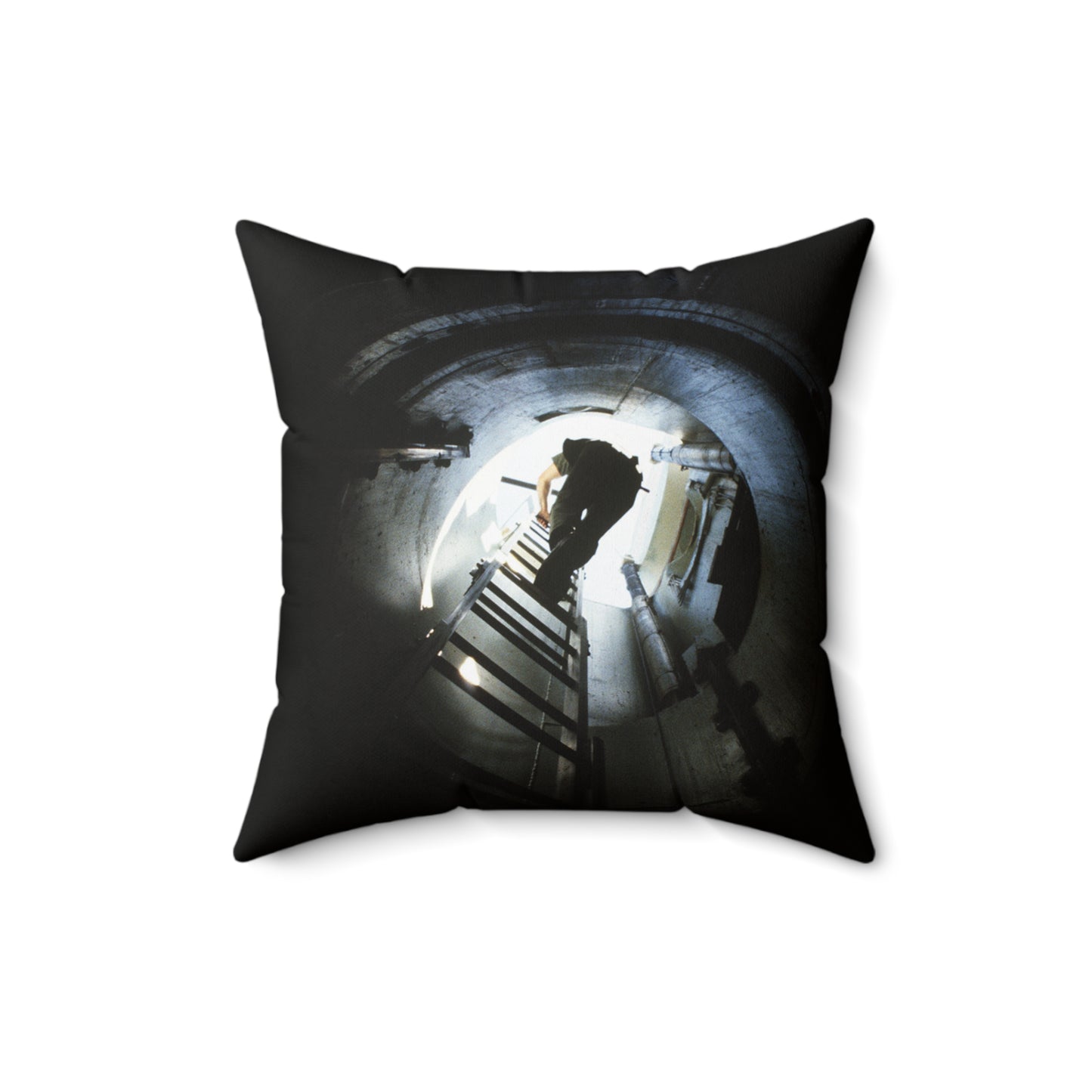 A 44th Field Missile Maintenance Squadron maintenance technician climbs down a ladder into a Minuteman missile support facility Decorative Accent Square Pillow