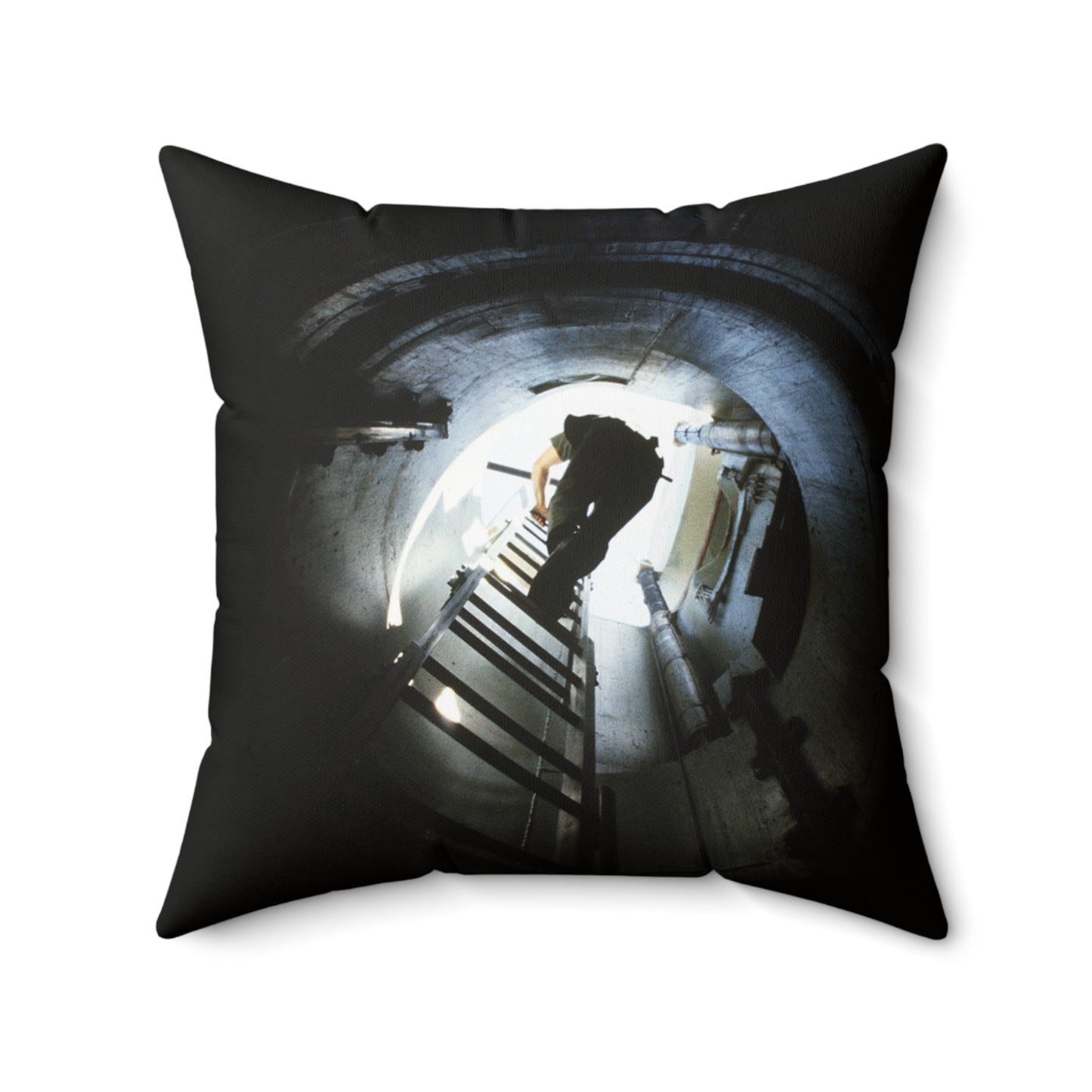 A 44th Field Missile Maintenance Squadron maintenance technician climbs down a ladder into a Minuteman missile support facility Decorative Accent Square Pillow