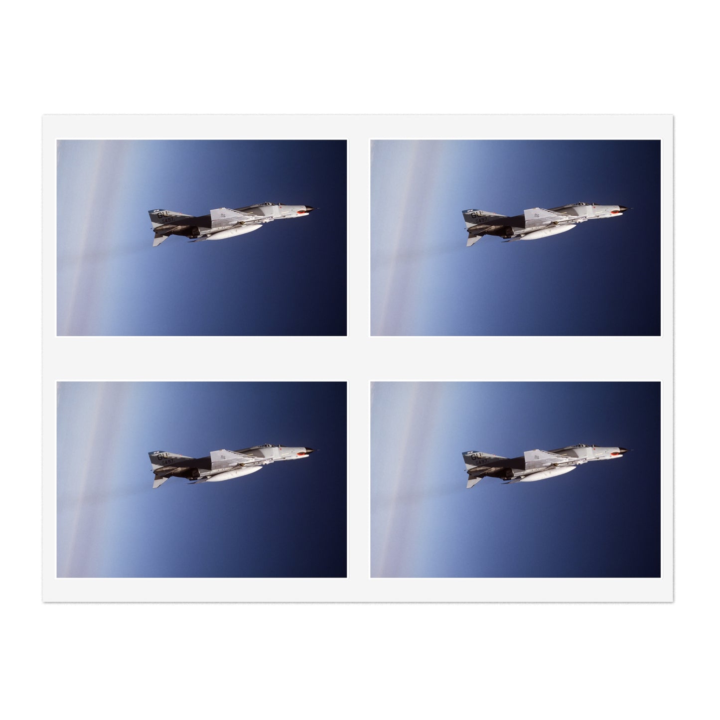An air-to-air right side view of a 497th Tactical Fighter Squadron F-4E Phantom II aircraft in a vertical climb during Exercise TEAM SPIRIT'86. The aircraft is armed with an AIM-9 Sidewinder missile Laminated UV Protective Vinyl Stickers