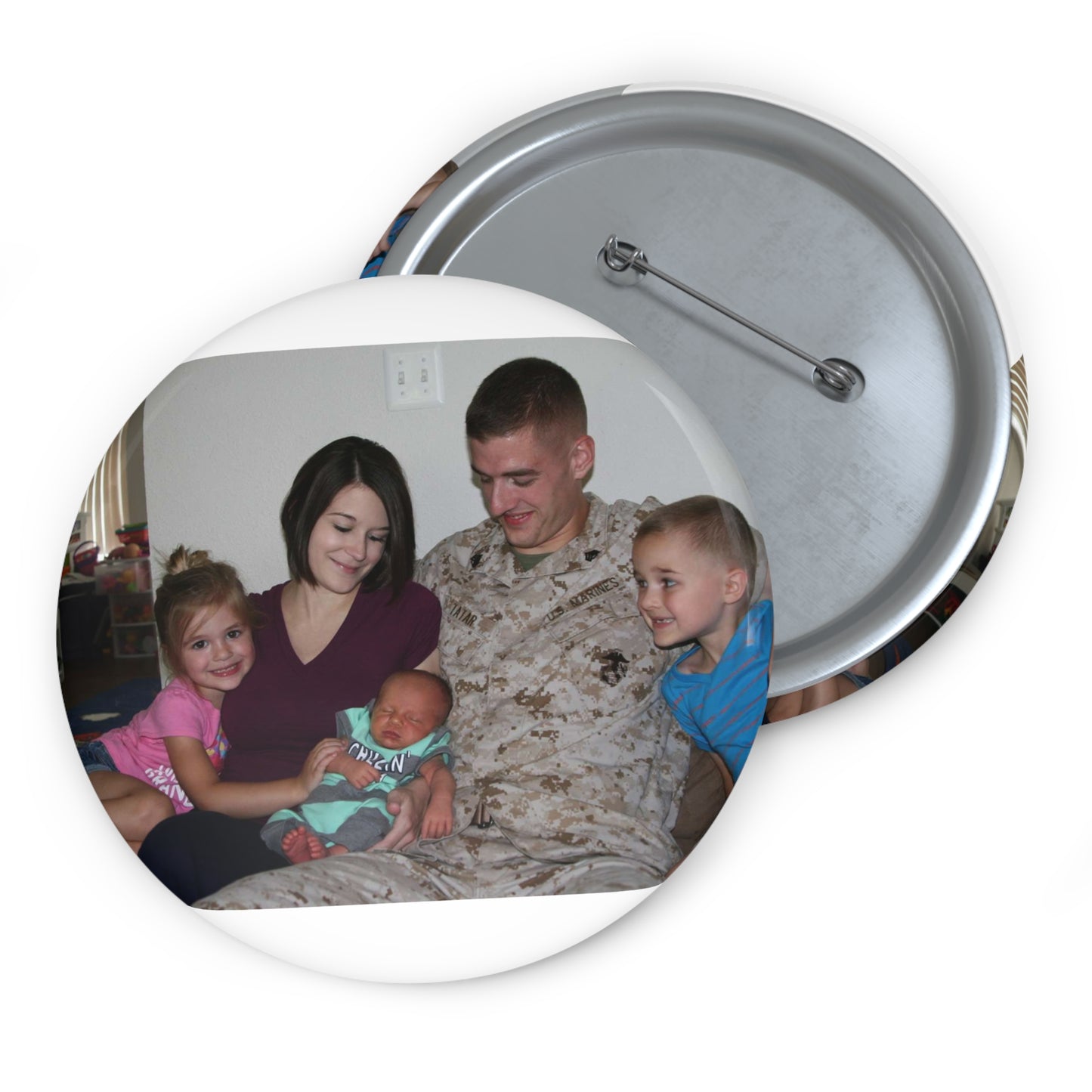 Sgt. Matthew Tatar and his wife Tiffany in their home Pin Buttons with Crisp Design