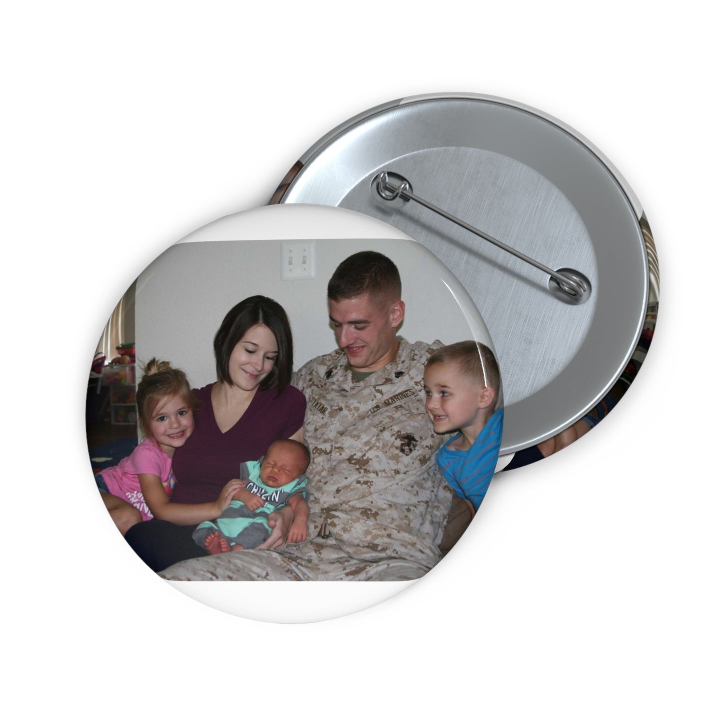 Sgt. Matthew Tatar and his wife Tiffany in their home Pin Buttons with Crisp Design