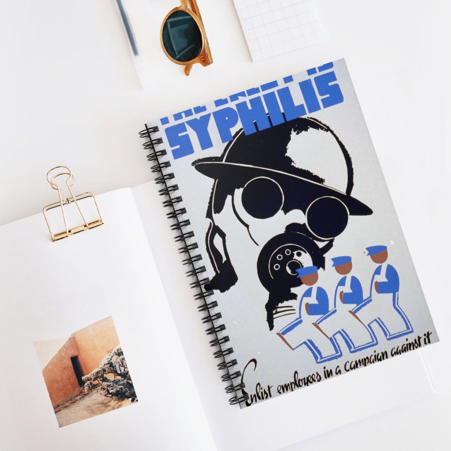 The enemy is syphilis Enlist employees in a campaign against it. Spiral Bound Ruled Notebook with Printed Cover