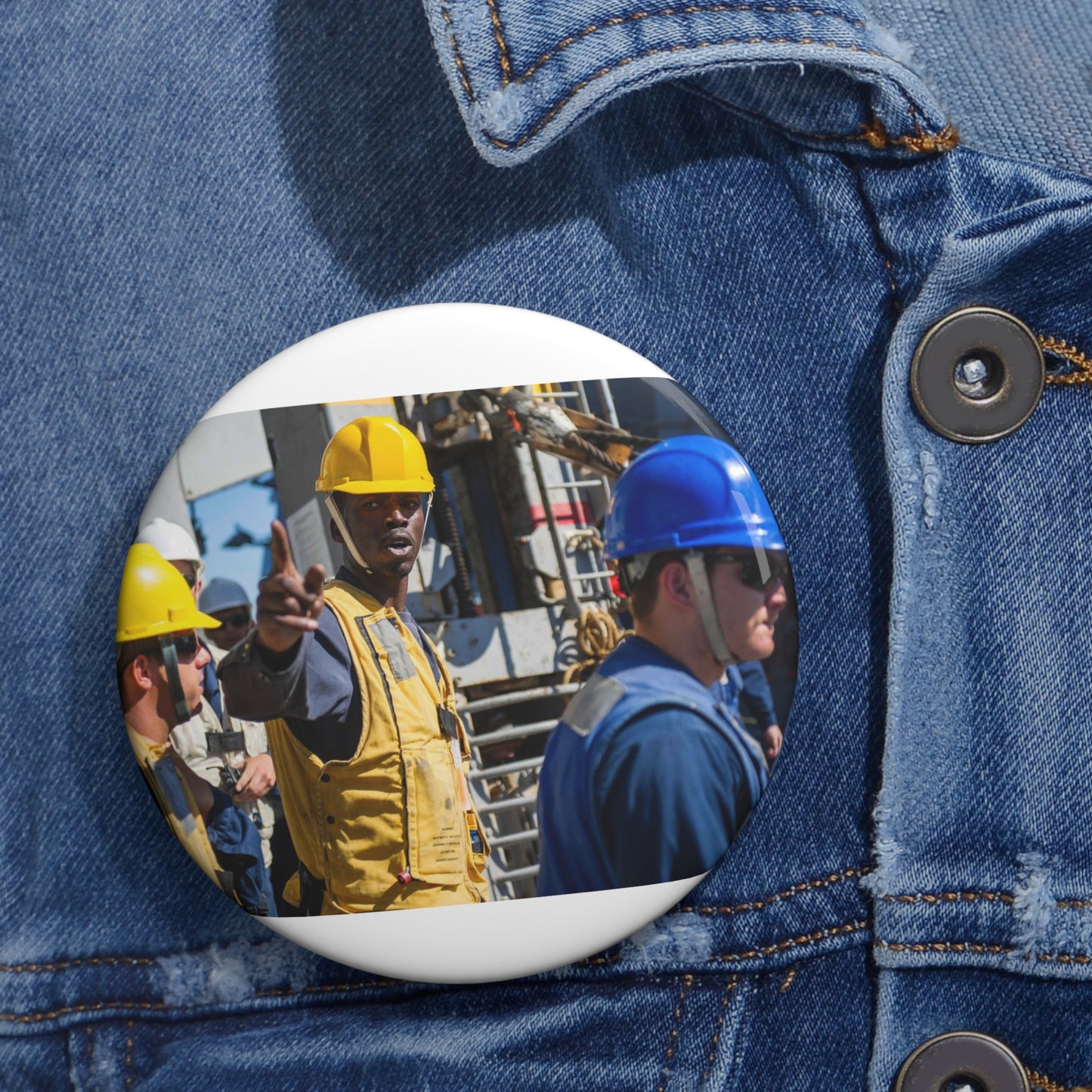 Seaman Glenrick Henry directs crew members as rig captain Pin Buttons with Crisp Design