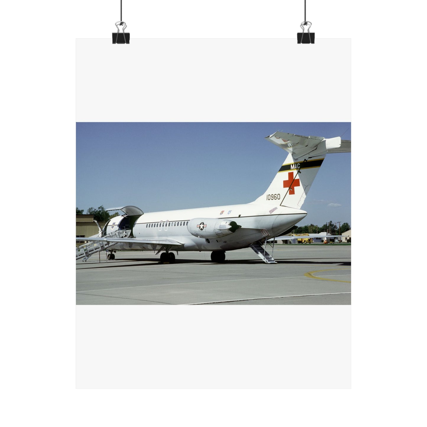 A left rear view of a 375th Aeromedical Airlift Wing a C-9 Nightingale aircraft on the flight line with staircase and loading ramp inposition High Quality Matte Wall Art Poster for Home, Office, Classroom