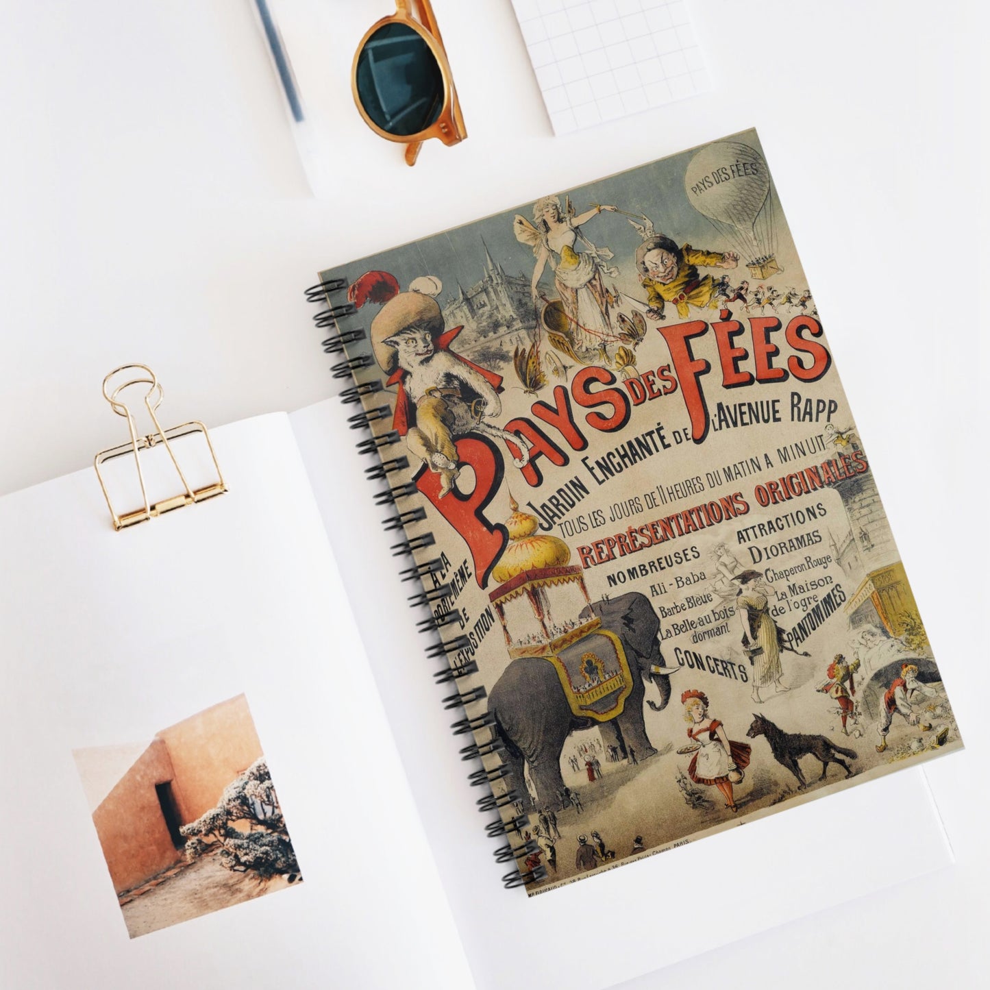 PAYS DES FEES/ JARDIN ENCHANTE DE L'AVENUE RAPP/ TOUS LES JOURS DE 11 HEURES DU MATIN A MINUIT/ REPRESENTATIONS ORIGINALES/ NOMBREUSES ATTRACTIONS/ DIORAMAS Spiral Bound Ruled Notebook with Printed Cover