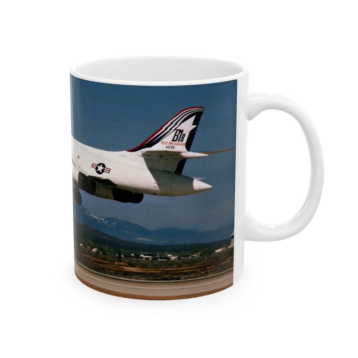 A left side view of the B-1B test program aircraft, originally the No. 2 B-1 prototype, landing after a test flight Beautiful Novelty Ceramic Coffee Mug 11oz