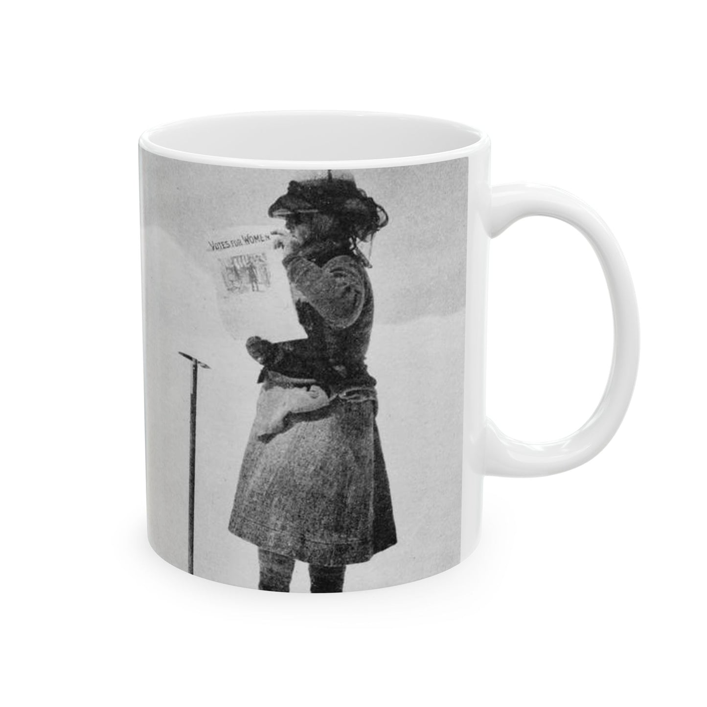 FannyBullockWorkmanVotesWomen - A woman standing in the snow holding a sign Beautiful Novelty Ceramic Coffee Mug 11oz