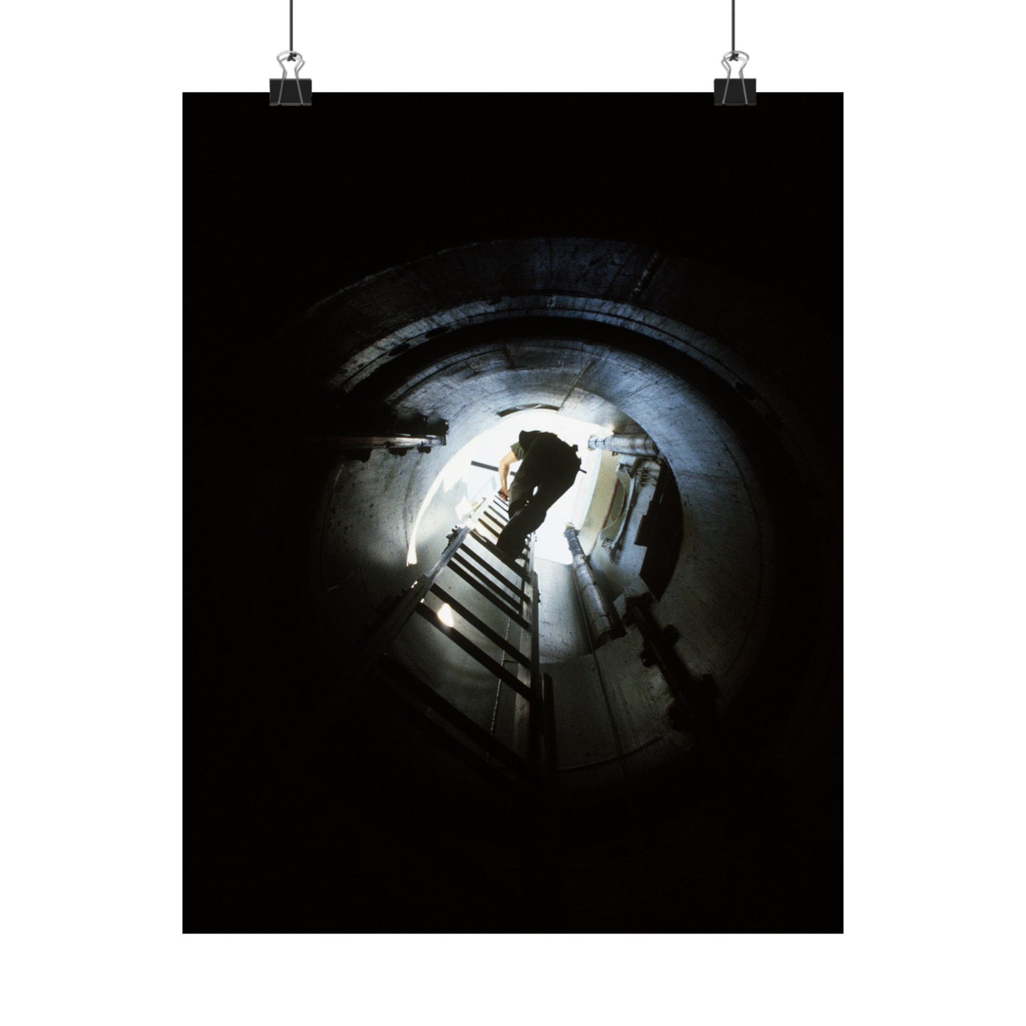 A 44th Field Missile Maintenance Squadron maintenance technician climbs down a ladder into a Minuteman missile support facility High Quality Matte Wall Art Poster for Home, Office, Classroom
