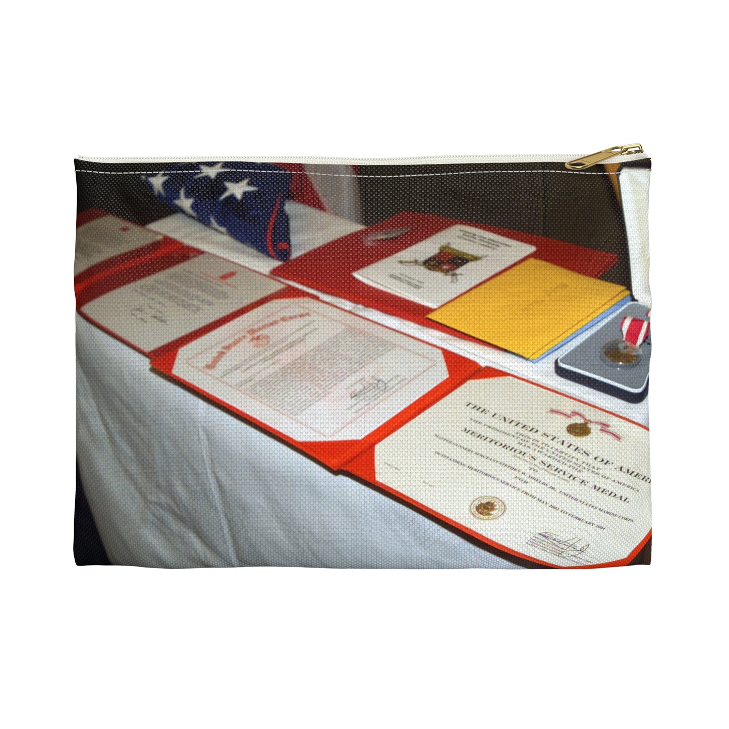 A display of US Marine Corps (USMC) MASTER GUNNERY Sergeant (MGYSGT) Stephen W. Shields' awards lay on a table during his retirement ceremony, at the Clubs of Quantico, Marine Corps Base (MCB) Quantico, Virginia Large Organizer Pouch with Black Zipper