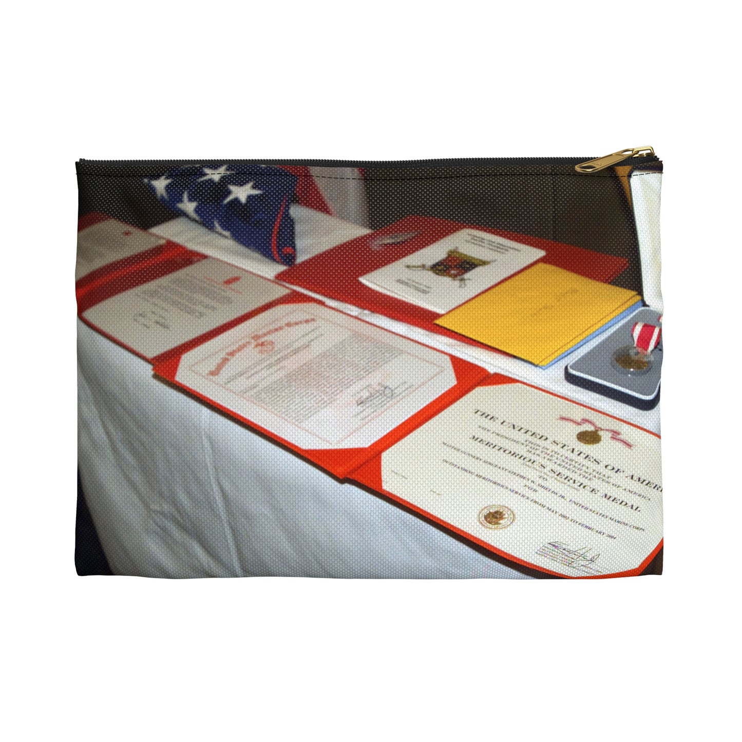 A display of US Marine Corps (USMC) MASTER GUNNERY Sergeant (MGYSGT) Stephen W. Shields' awards lay on a table during his retirement ceremony, at the Clubs of Quantico, Marine Corps Base (MCB) Quantico, Virginia Large Organizer Pouch with Black Zipper