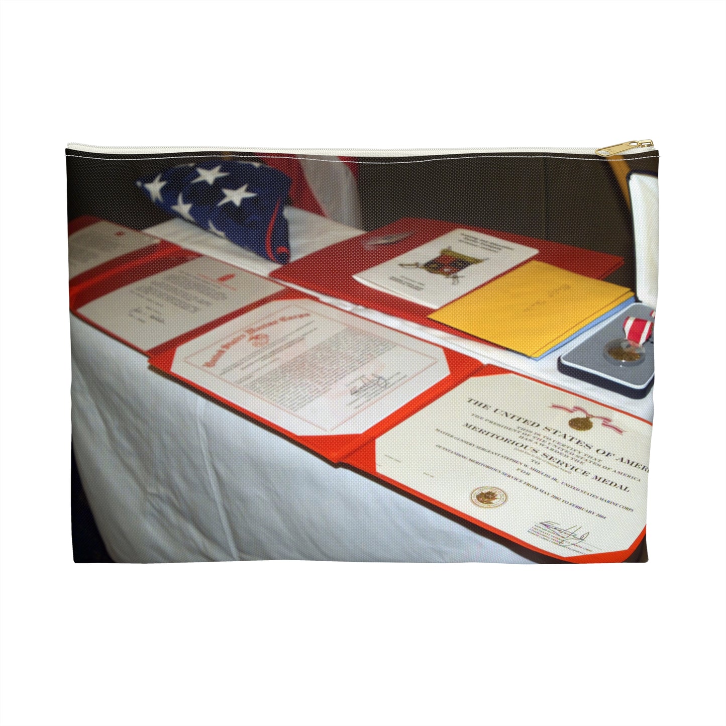 A display of US Marine Corps (USMC) MASTER GUNNERY Sergeant (MGYSGT) Stephen W. Shields' awards lay on a table during his retirement ceremony, at the Clubs of Quantico, Marine Corps Base (MCB) Quantico, Virginia Large Organizer Pouch with Black Zipper