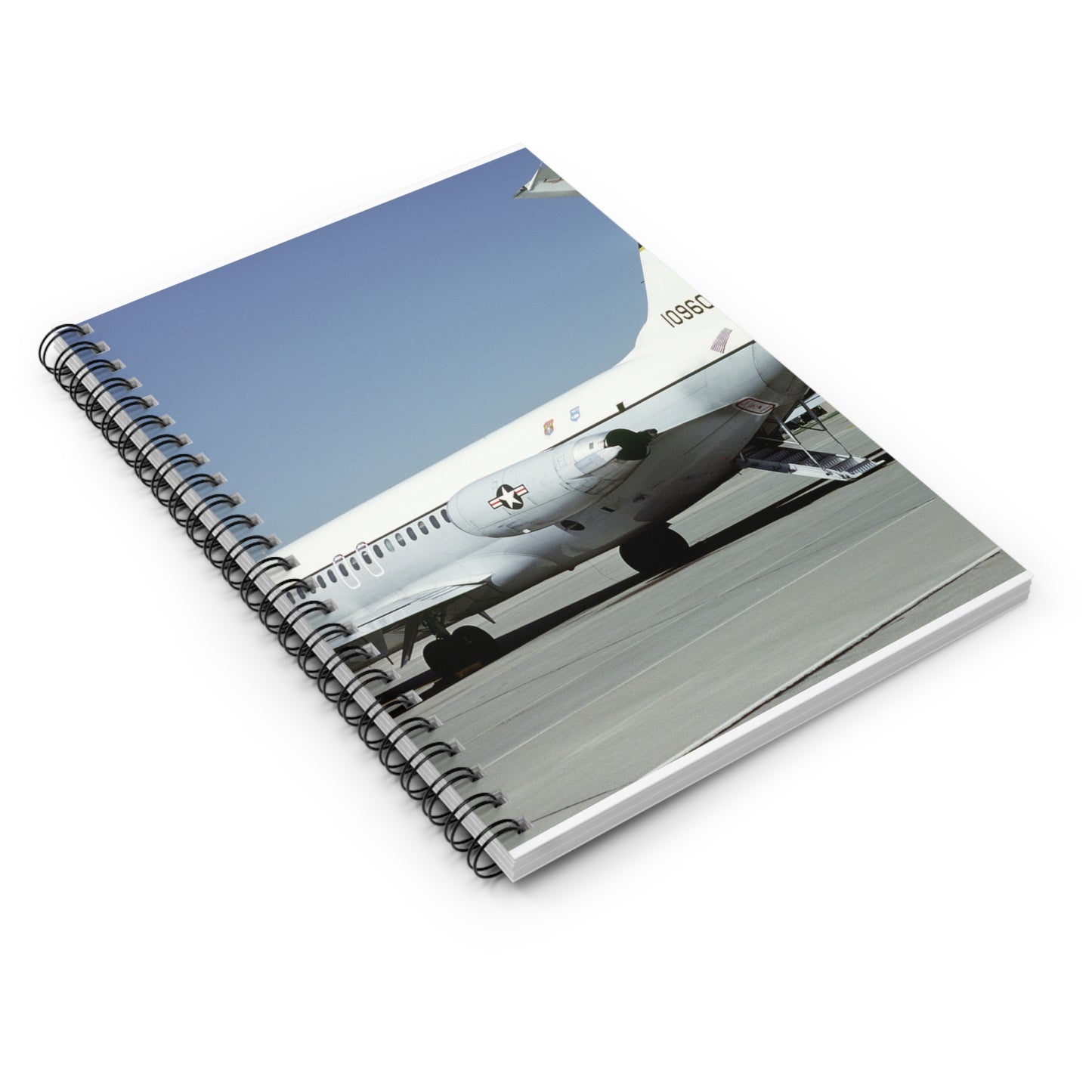 A left rear view of a 375th Aeromedical Airlift Wing a C-9 Nightingale aircraft on the flight line with staircase and loading ramp inposition Spiral Bound Ruled Notebook with Printed Cover