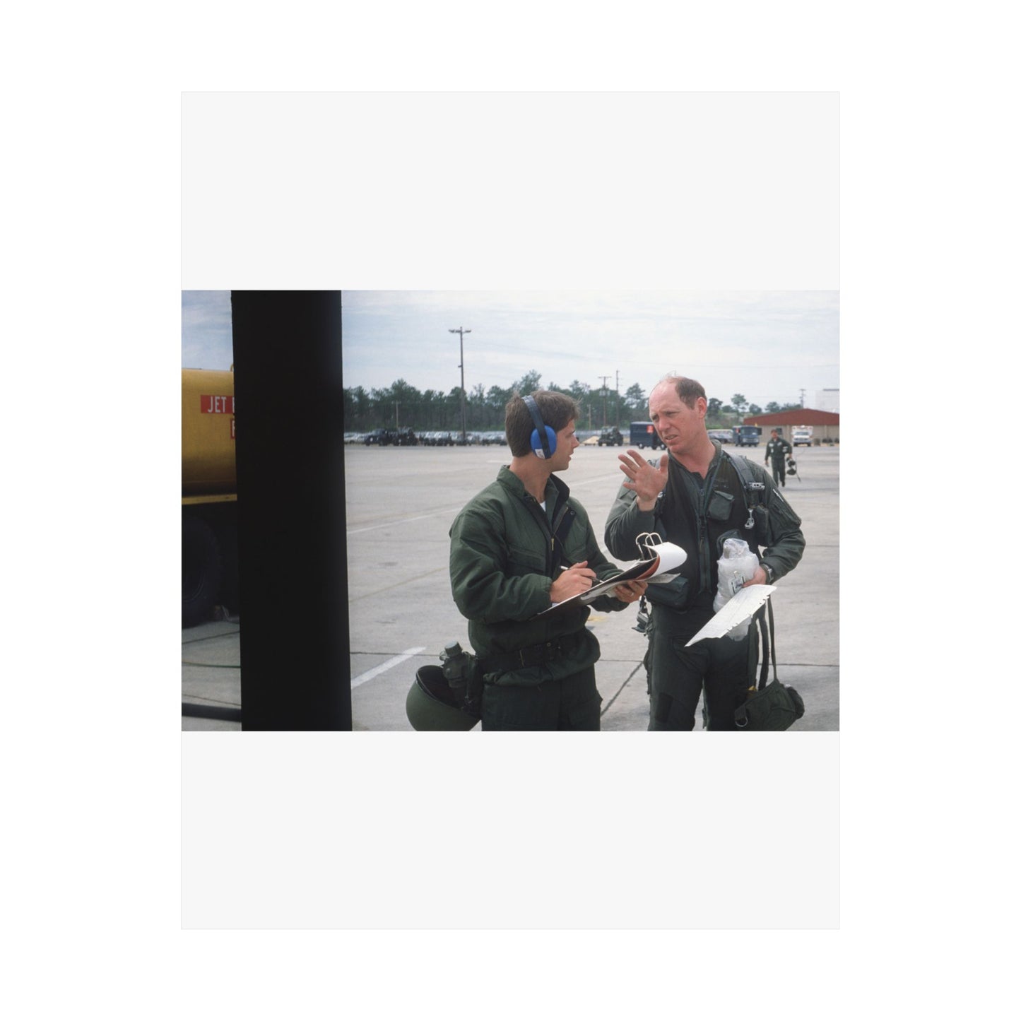 Colonel Tom Barber (right), director of operations, 33rd Tactical Fighter Wing (33rd TFW) is debriefed by First Lieutenant Robert M. Haire (left), intelligence officer, 33rd TFW High Quality Matte Wall Art Poster for Home, Office, Classroom