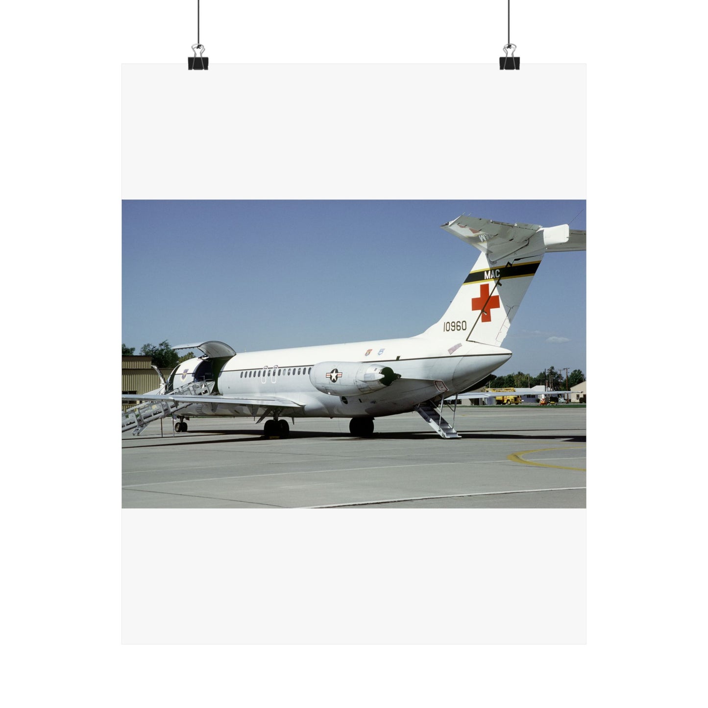 A left rear view of a 375th Aeromedical Airlift Wing a C-9 Nightingale aircraft on the flight line with staircase and loading ramp inposition High Quality Matte Wall Art Poster for Home, Office, Classroom