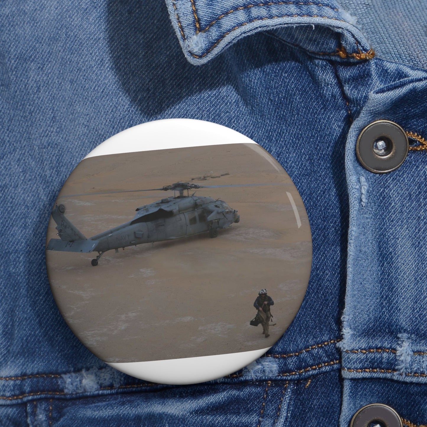 U.S. Navy Petty Officer 1st Class Douglas Crisp, leading Pin Buttons with Crisp Design