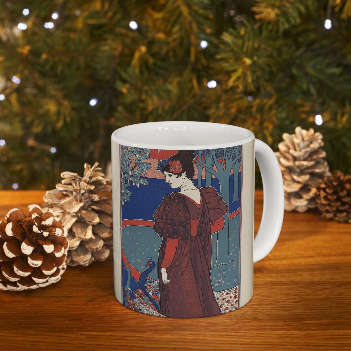 Louis Rhead - A woman stands looking at two peacocks. Beautiful Novelty Ceramic Coffee Mug 11oz