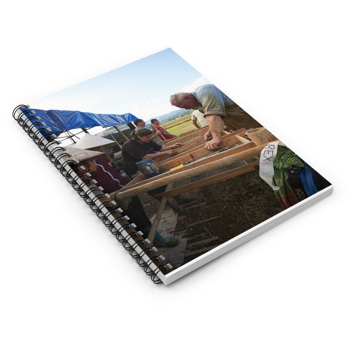 Local workers gather around Dr. Kimberly Maeyama, Defense Spiral Bound Ruled Notebook with Printed Cover