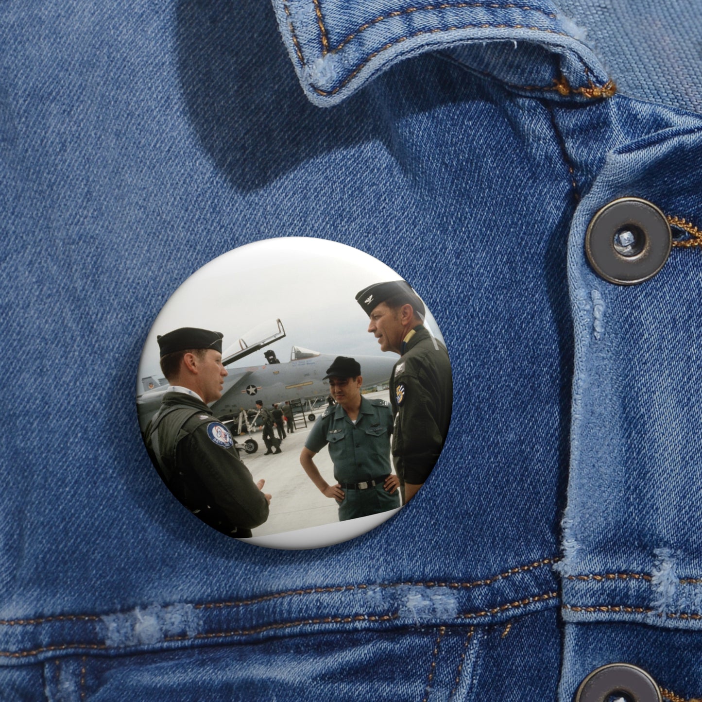 Upon his arrival, LTC Tom Barber (left), is greeted by Exercise Cope North '81-3 directors, COL George Peacock and Japanese Air SelF Defense Force COL V. Nomura Pin Buttons with Crisp Design