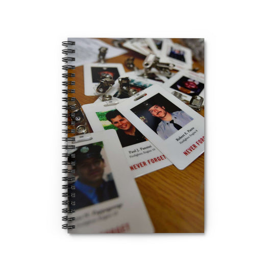 Badges with photos of 9/11 emergency responders, sit Spiral Bound Ruled Notebook with Printed Cover