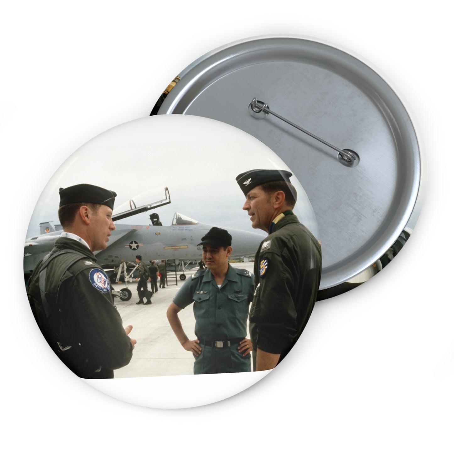 Upon his arrival, LTC Tom Barber (left), is greeted by Exercise Cope North '81-3 directors, COL George Peacock and Japanese Air SelF Defense Force COL V. Nomura Pin Buttons with Crisp Design