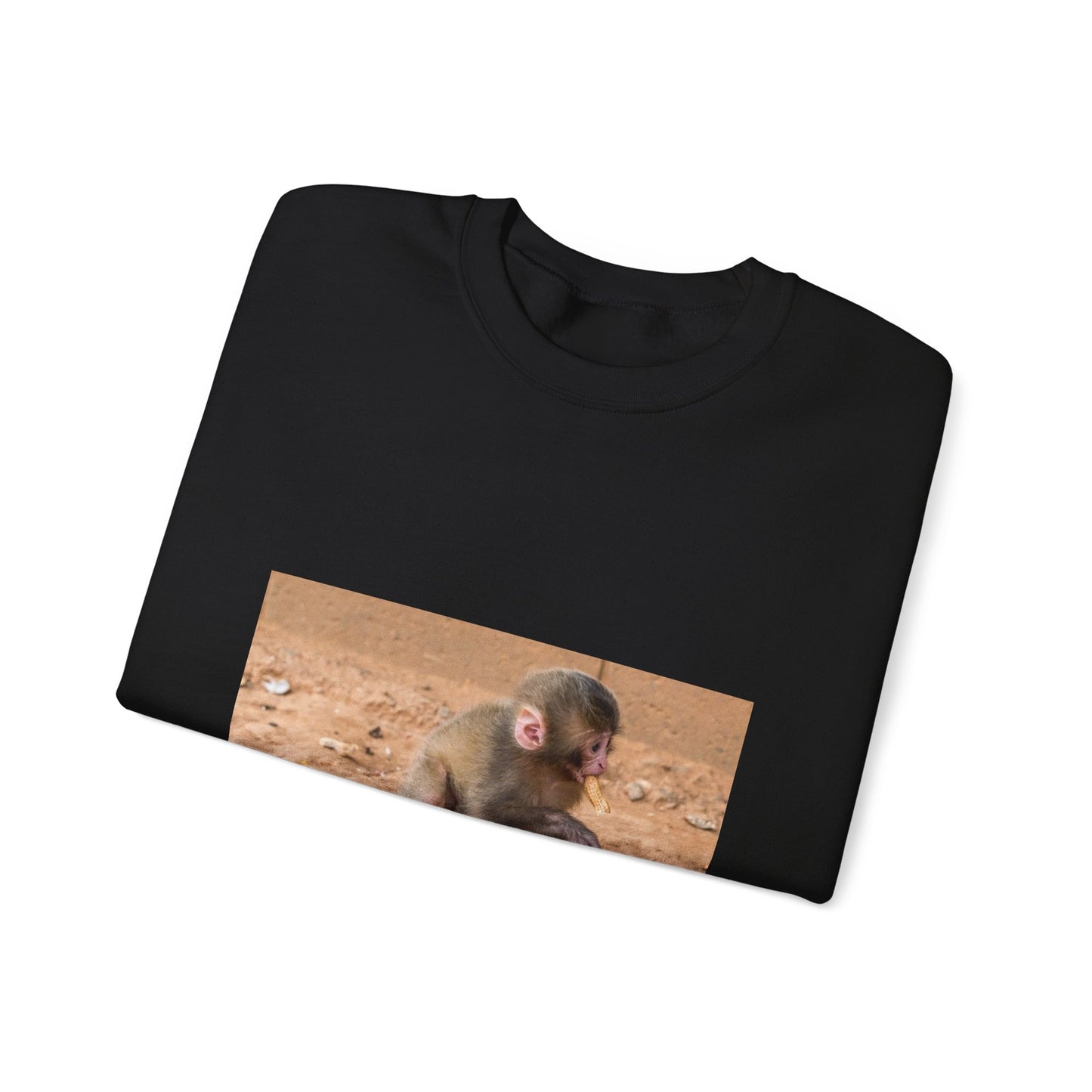 Public domain stock image. Monkey baby eating peanut. Black Heavy Blend Adult Crew Neck SweatShirt