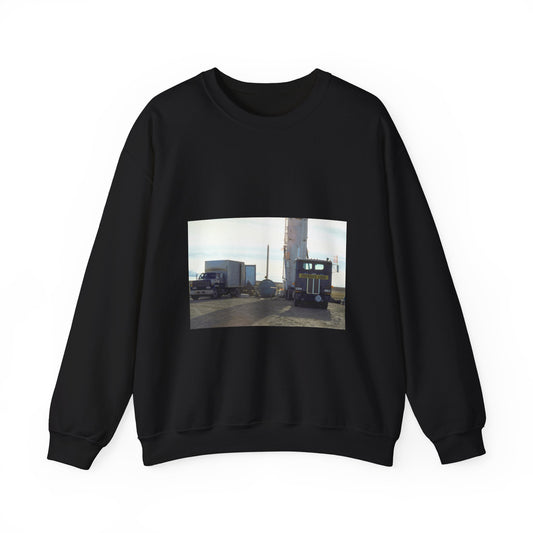 Members of the 44th Missile Maintenance Squadron erect a missile maintenance vehicle in preparation for the removal of an LGM-30F Minuteman II intercontinental ballistic missile. Black Heavy Blend Adult Crew Neck SweatShirt
