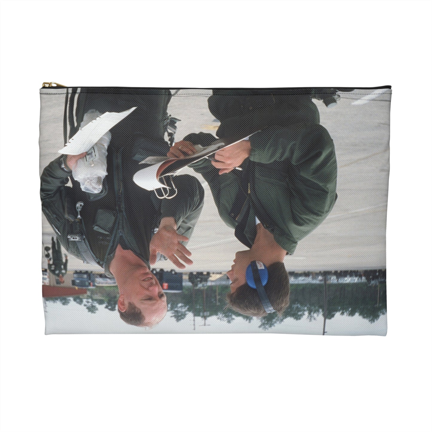 Colonel Tom Barber (right), director of operations, 33rd Tactical Fighter Wing (33rd TFW) is debriefed by First Lieutenant Robert M. Haire (left), intelligence officer, 33rd TFW - Accessory Pouch