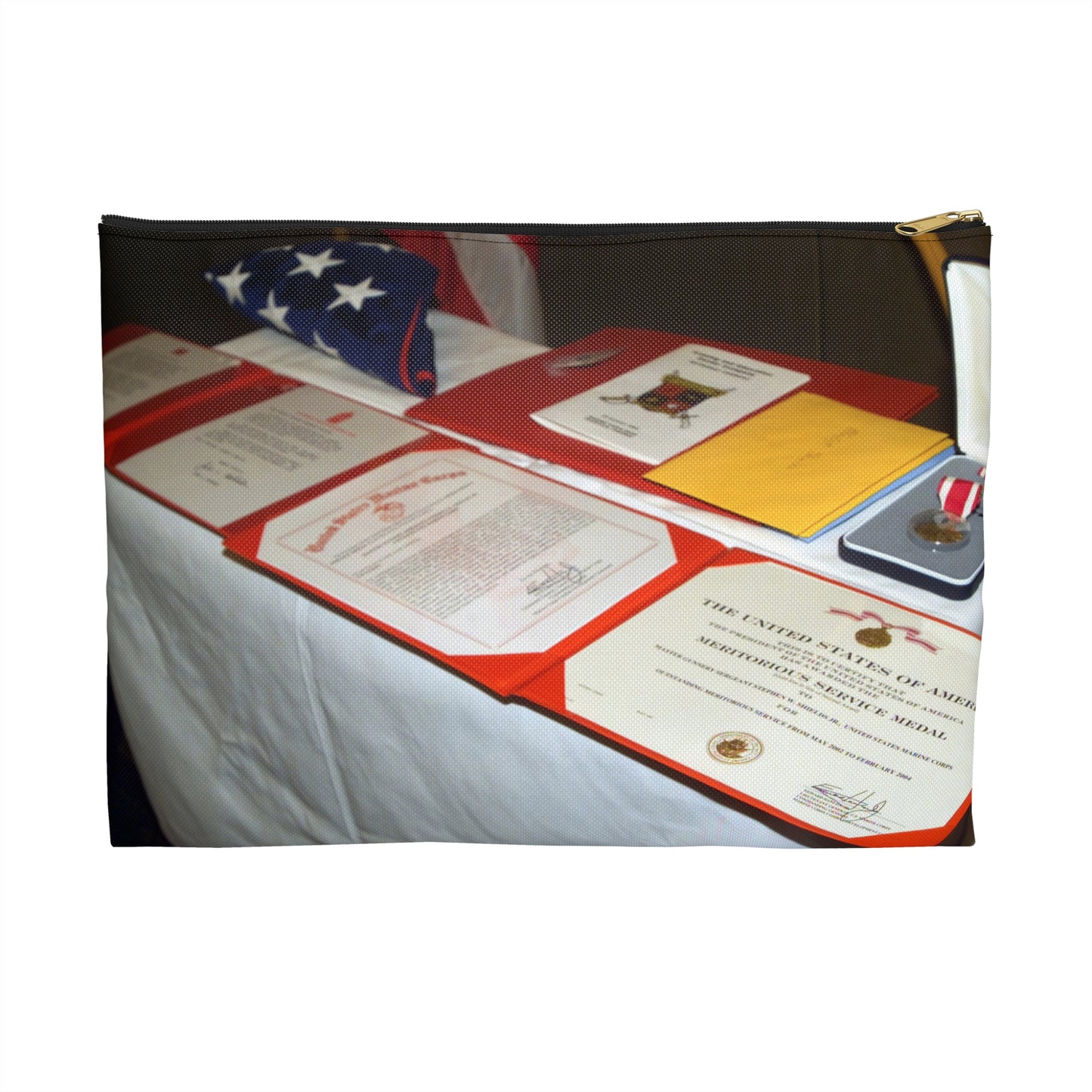 A display of US Marine Corps (USMC) MASTER GUNNERY Sergeant (MGYSGT) Stephen W. Shields' awards lay on a table during his retirement ceremony, at the Clubs of Quantico, Marine Corps Base (MCB) Quantico, Virginia Large Organizer Pouch with Black Zipper