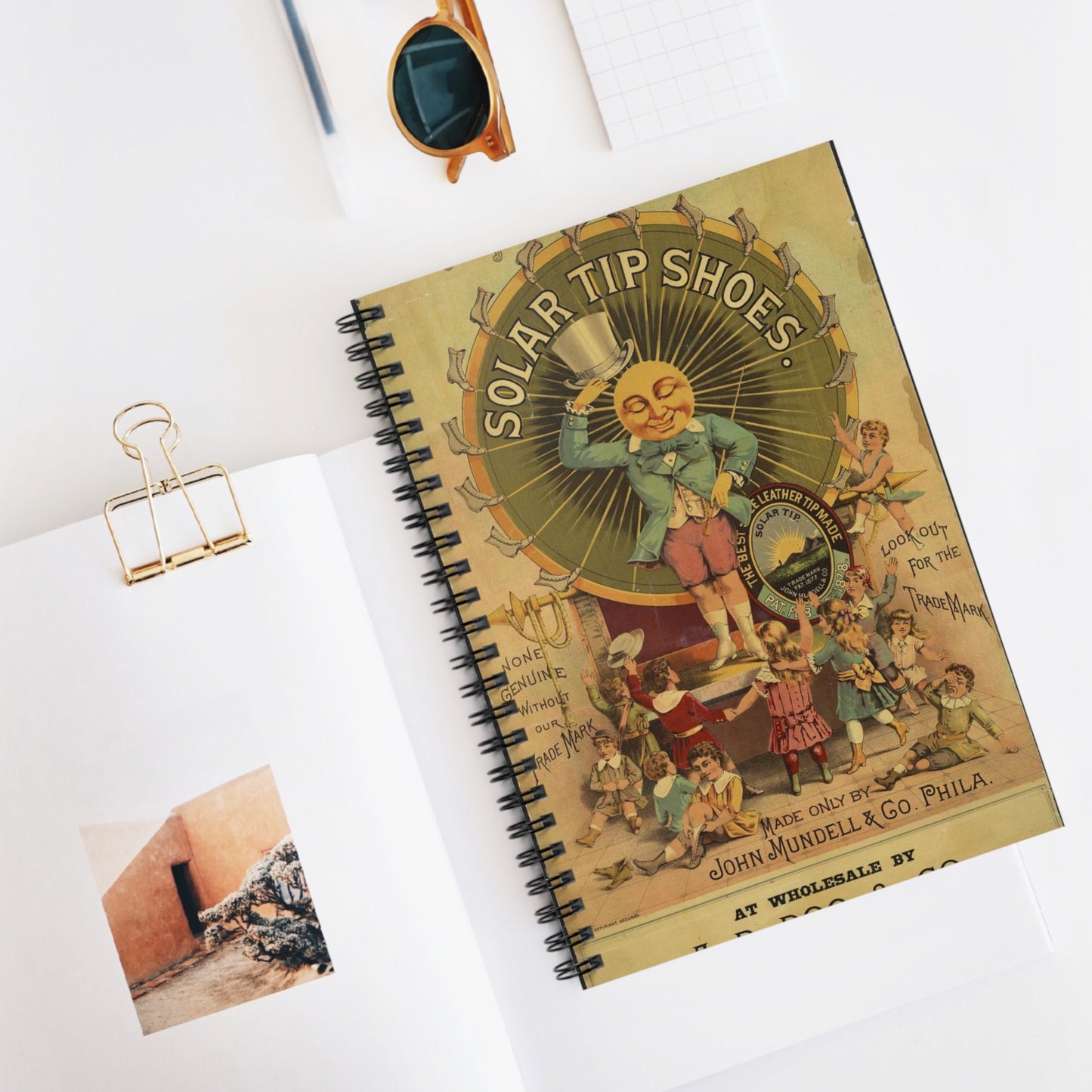 John Mundell & Co's solar tip shoes Made only by John Mundell & Co. Philadelphia. Spiral Bound Ruled Notebook with Printed Cover
