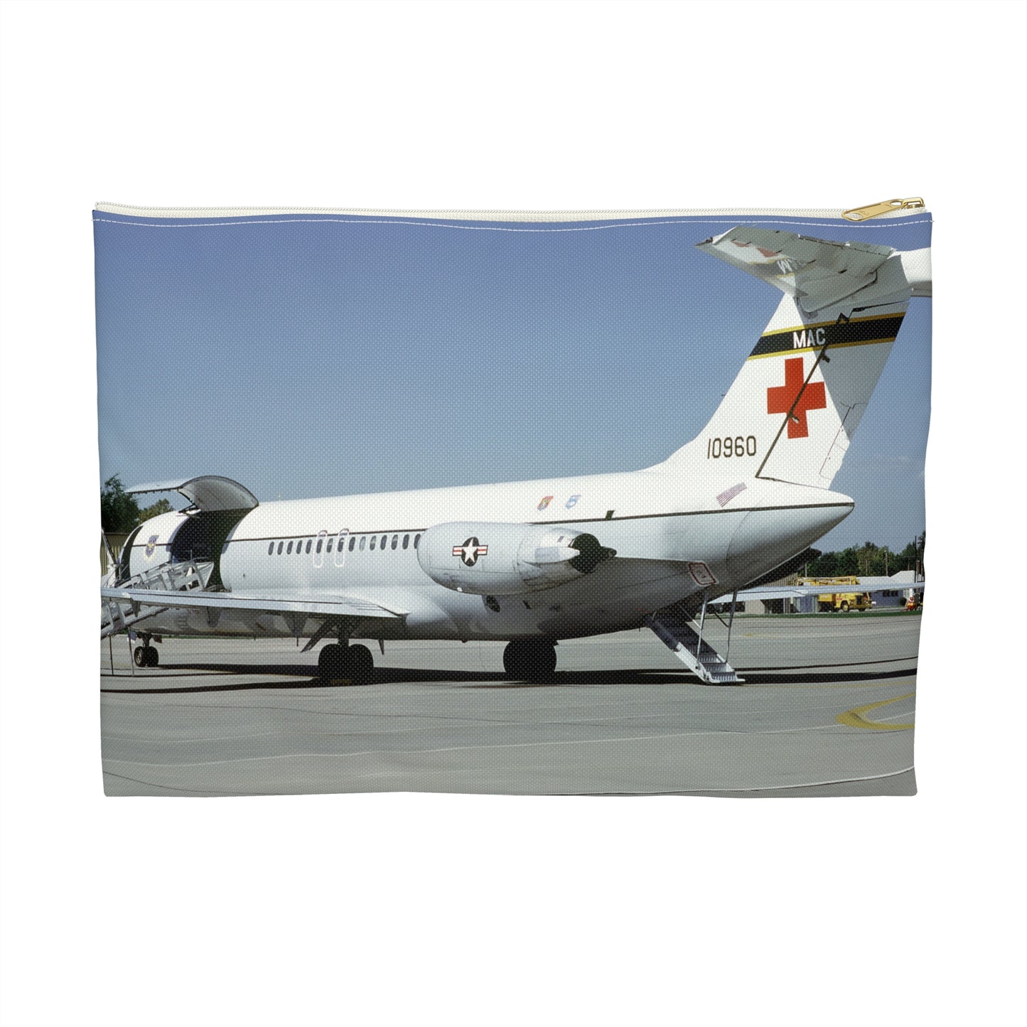 A left rear view of a 375th Aeromedical Airlift Wing a C-9 Nightingale aircraft on the flight line with staircase and loading ramp inposition Large Organizer Pouch with Black Zipper