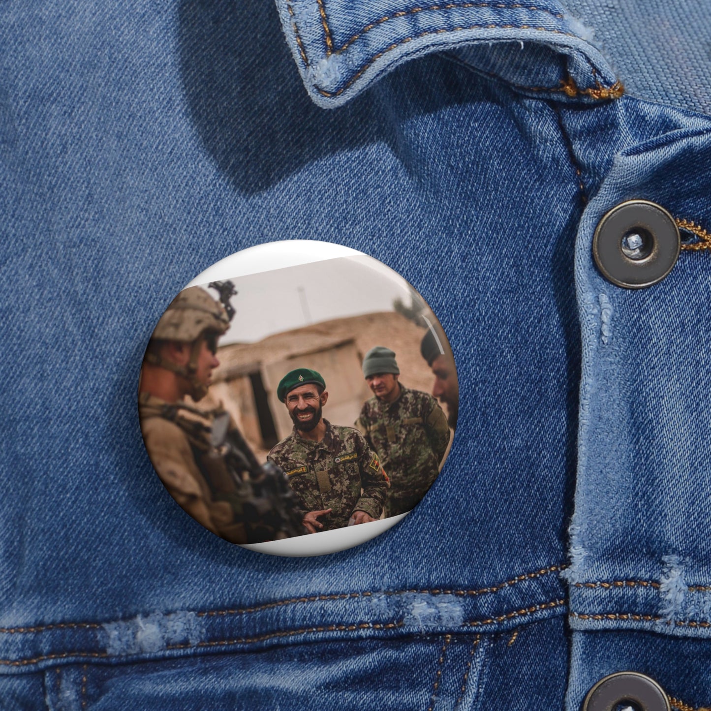 A U.S. Marine with Task Force Southwest (TFSW) converses Pin Buttons with Crisp Design