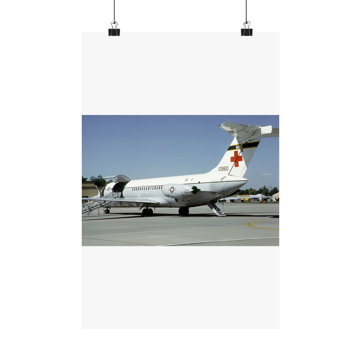 A left rear view of a 375th Aeromedical Airlift Wing a C-9 Nightingale aircraft on the flight line with staircase and loading ramp inposition High Quality Matte Wall Art Poster for Home, Office, Classroom