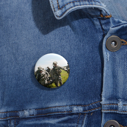 U.S. Army Sgt. Sean Fernandes (right), team leader, Pin Buttons with Crisp Design